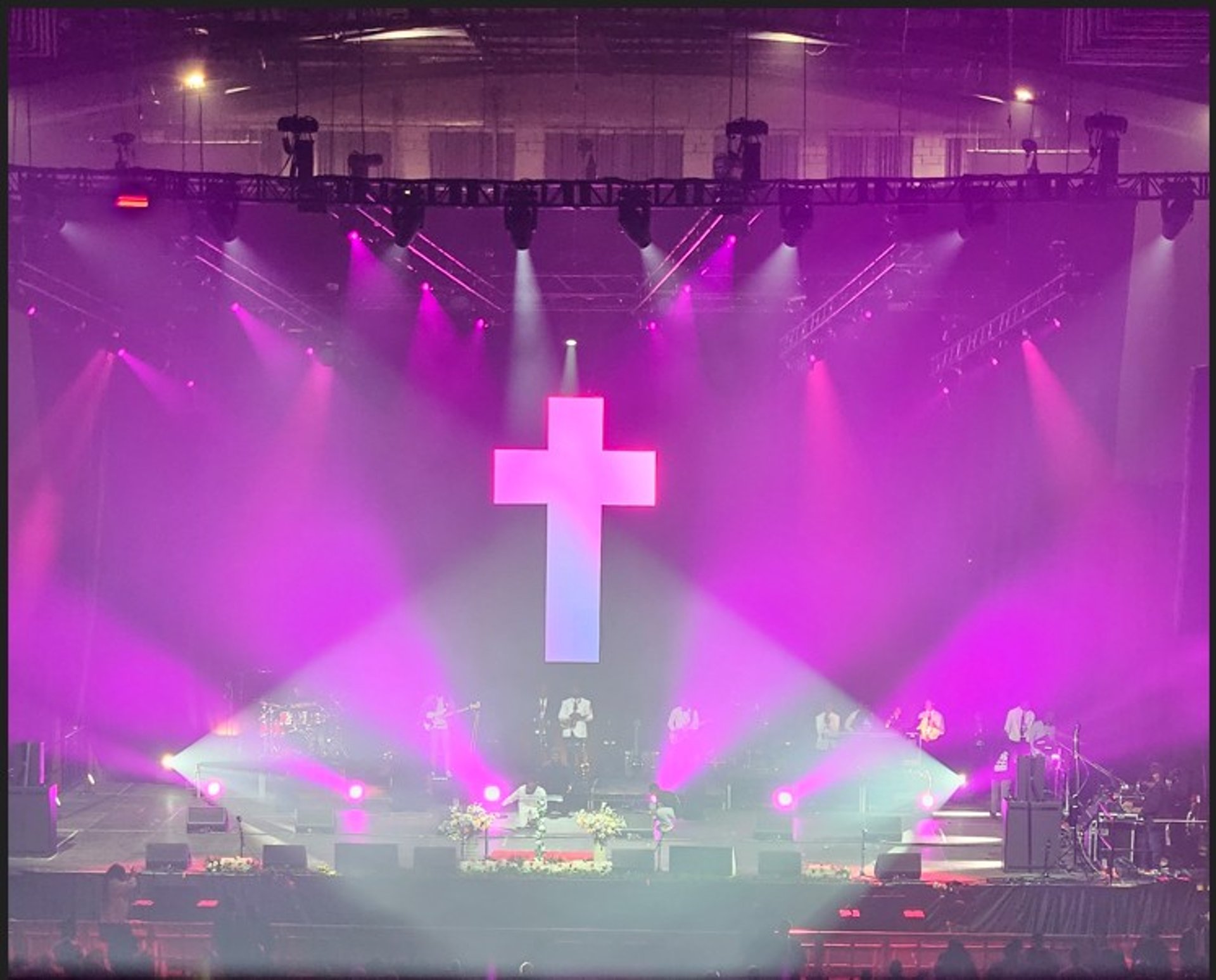 religious concert performed by a band on stage