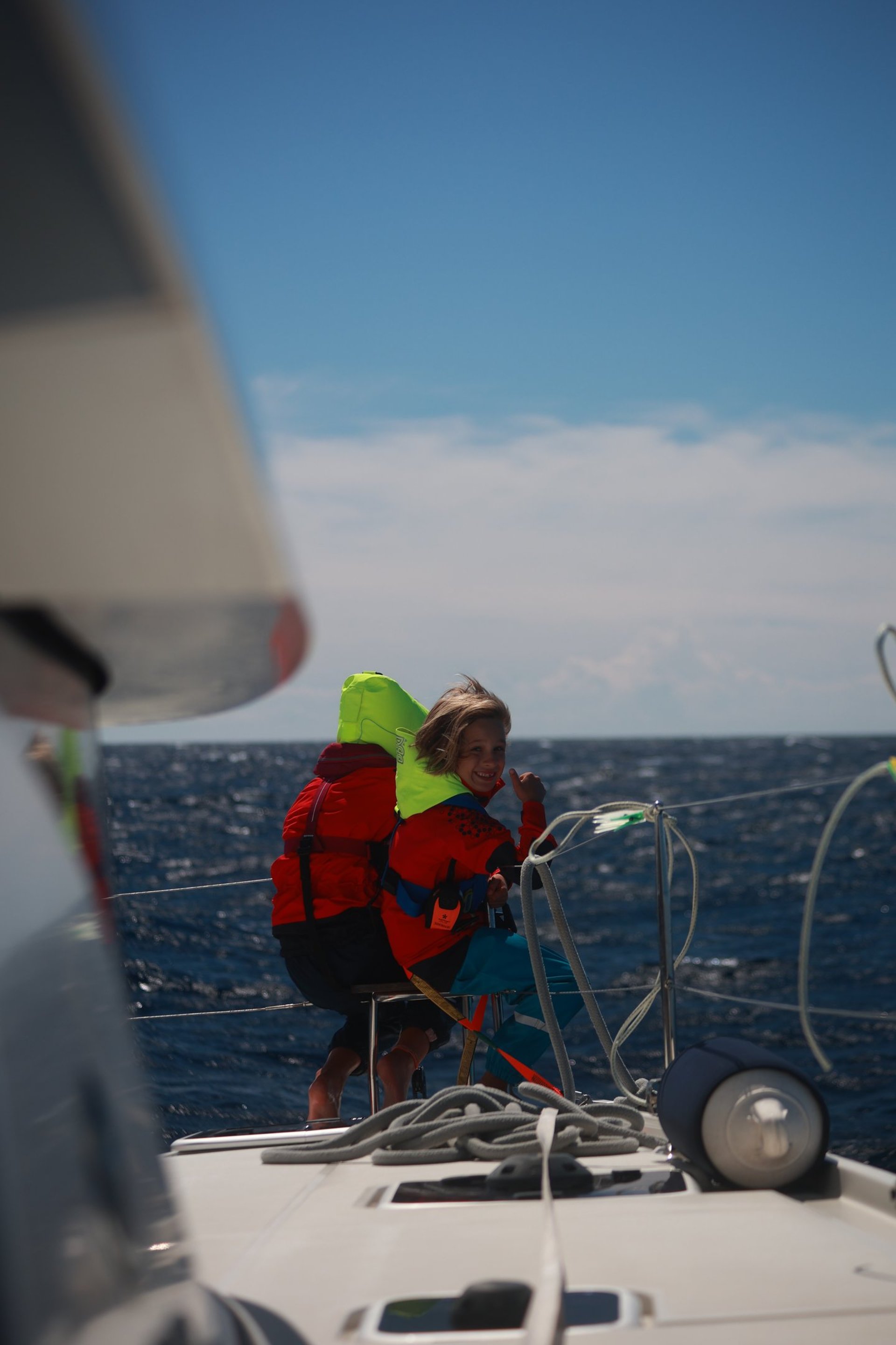 red fire extinguisher on green wall