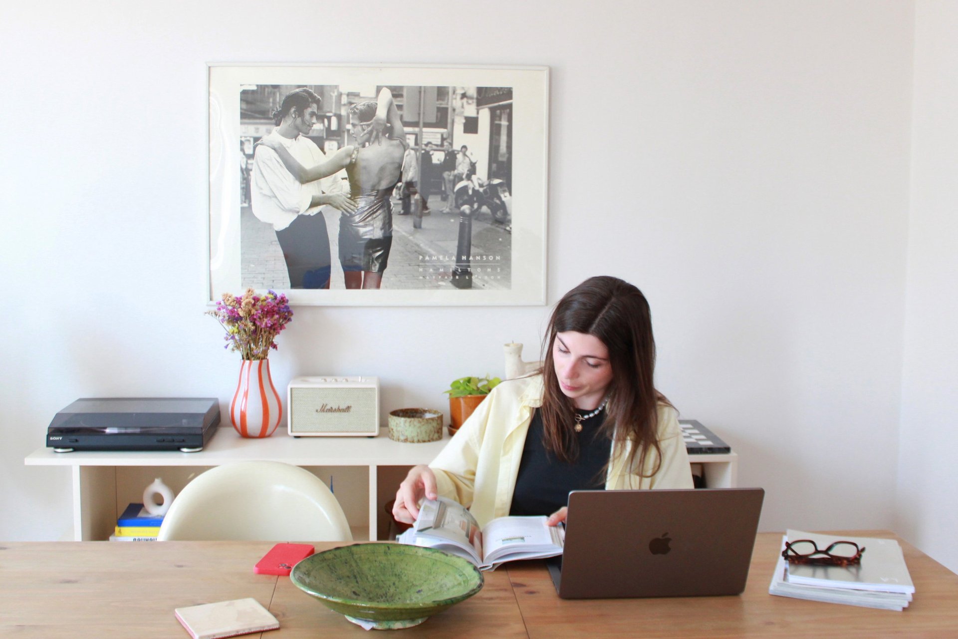 an abstract photo of a curved building with a blue sky in the background