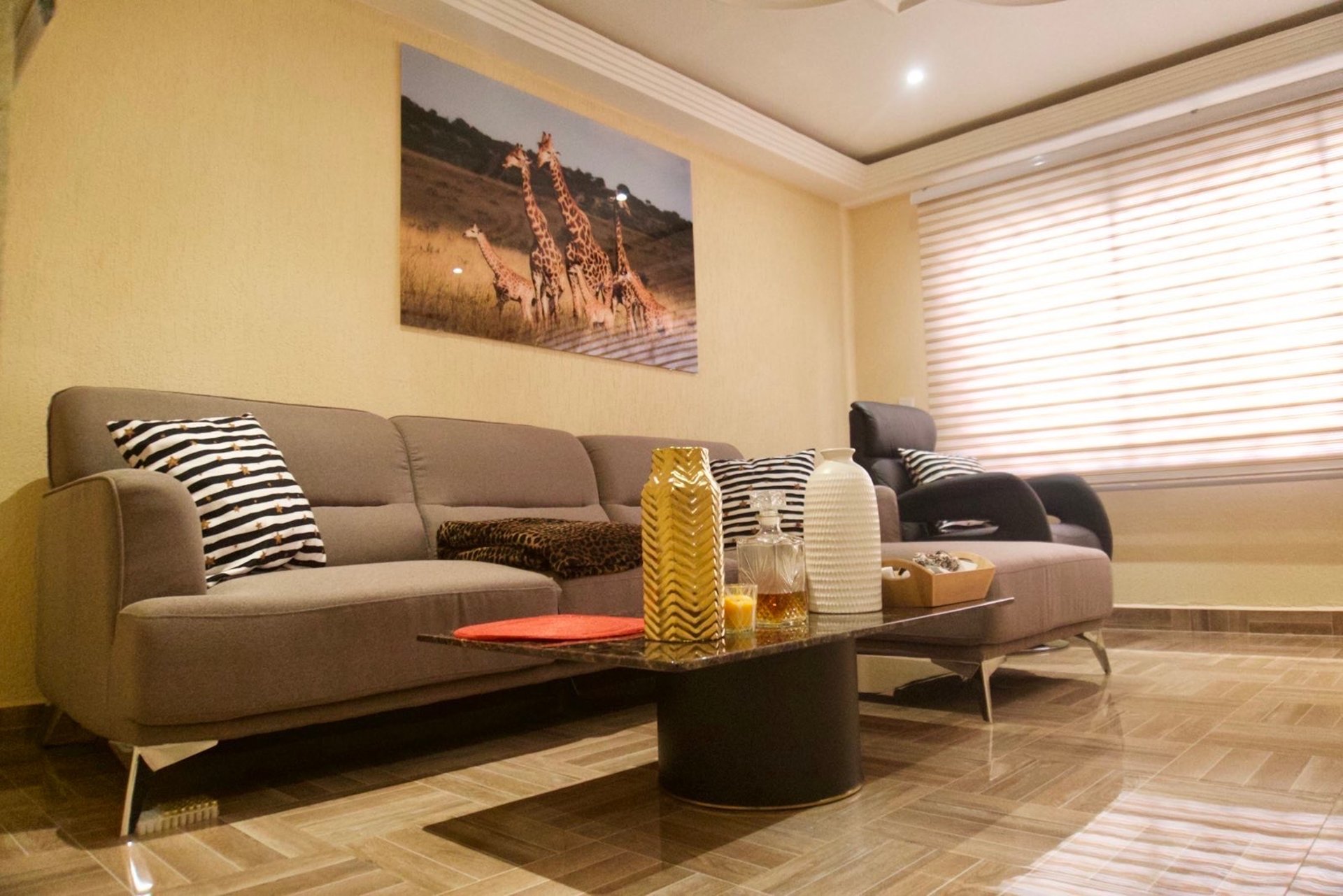 woman wearing yellow long-sleeved dress under white clouds and blue sky during daytime