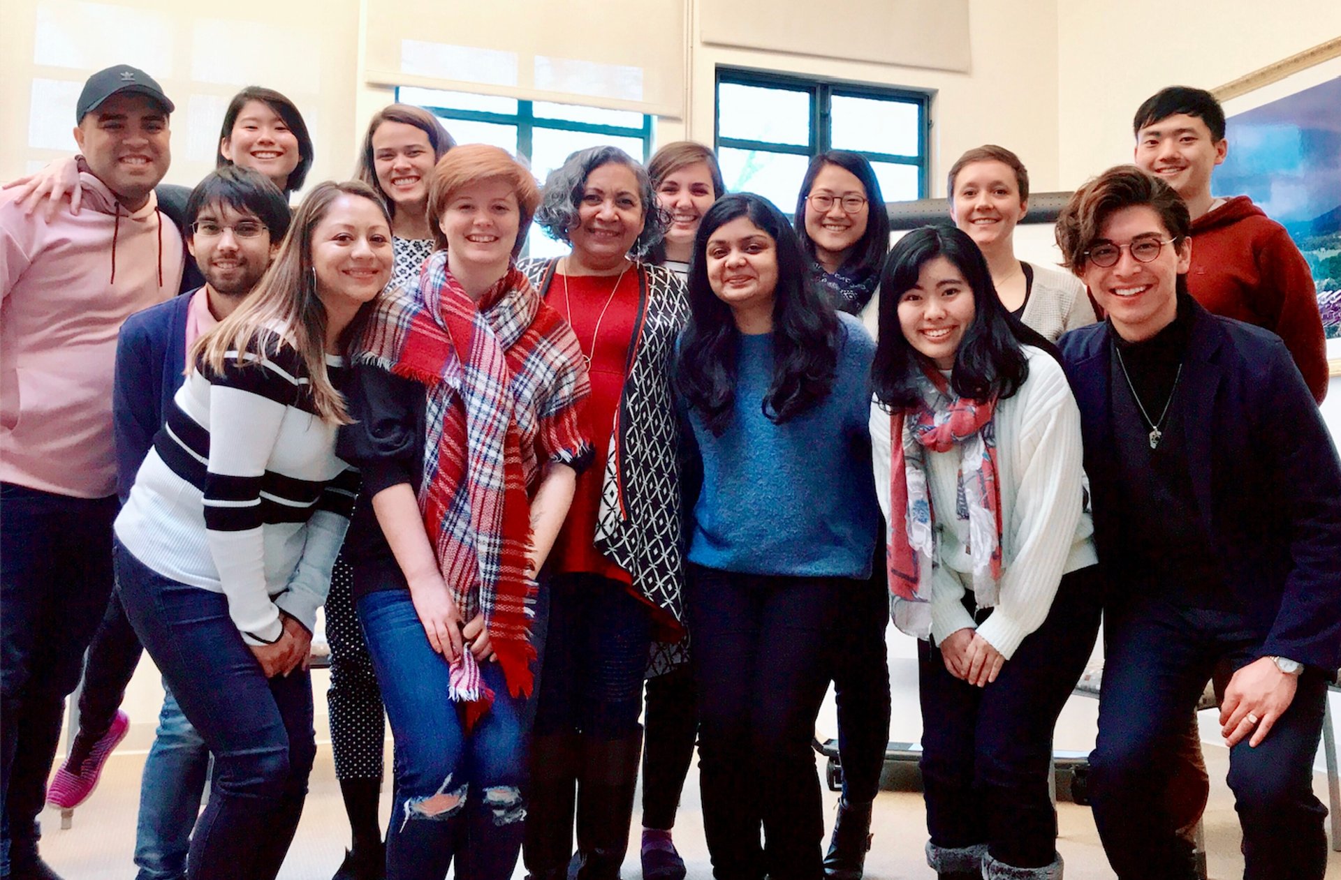 woman wearing yellow long-sleeved dress under white clouds and blue sky during daytime
