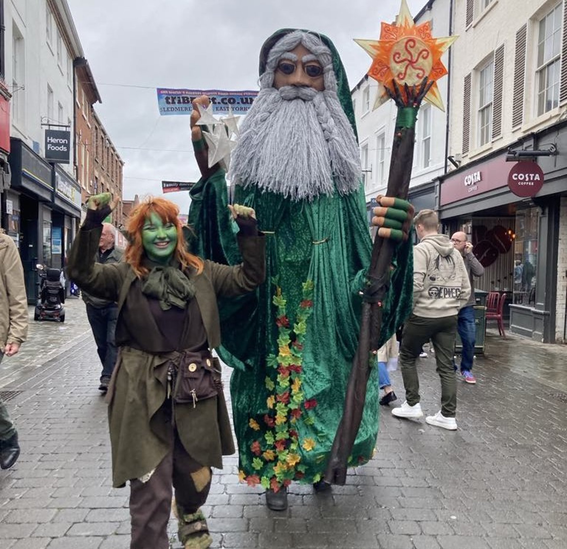 black and brown leather padded tub sofa