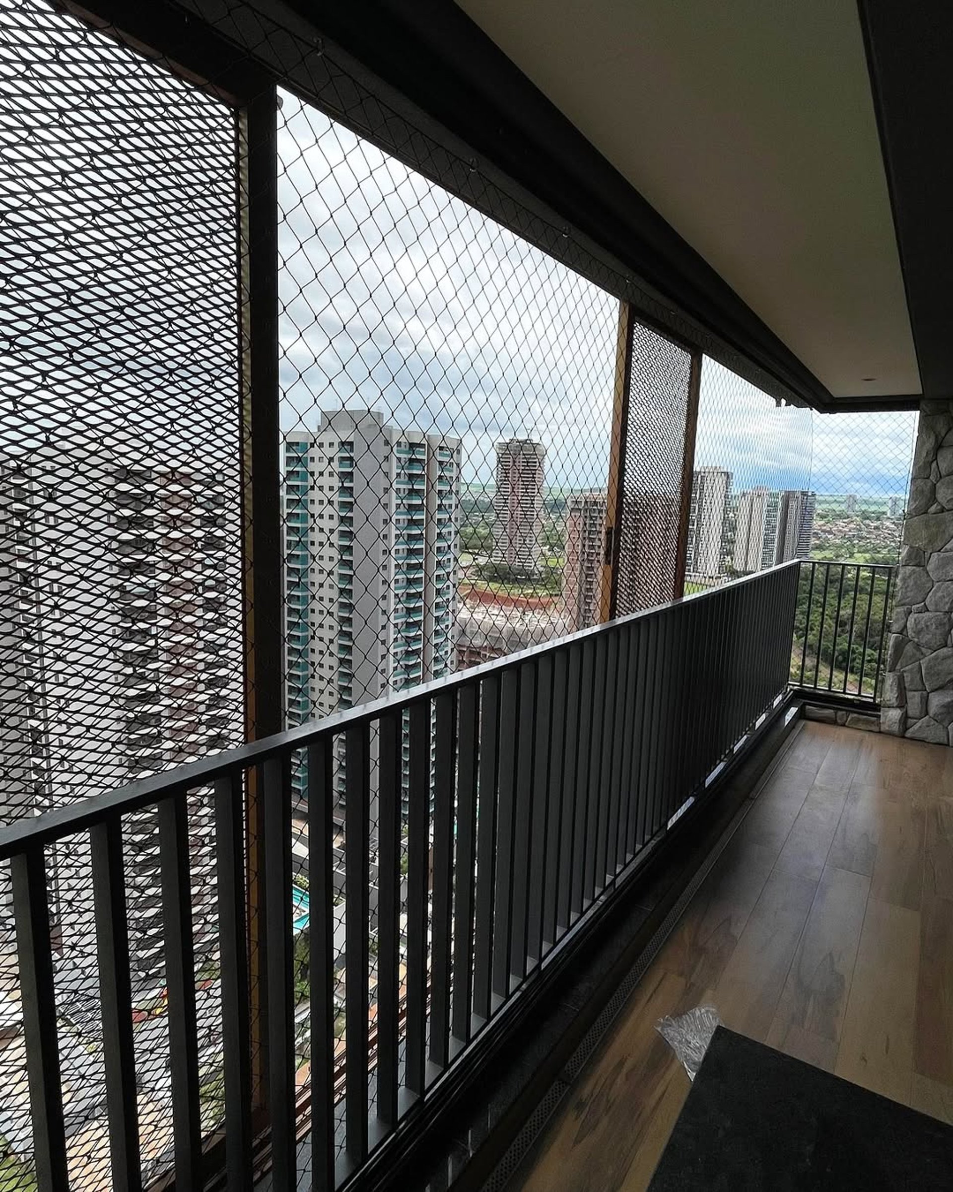 an abstract photo of a curved building with a blue sky in the background