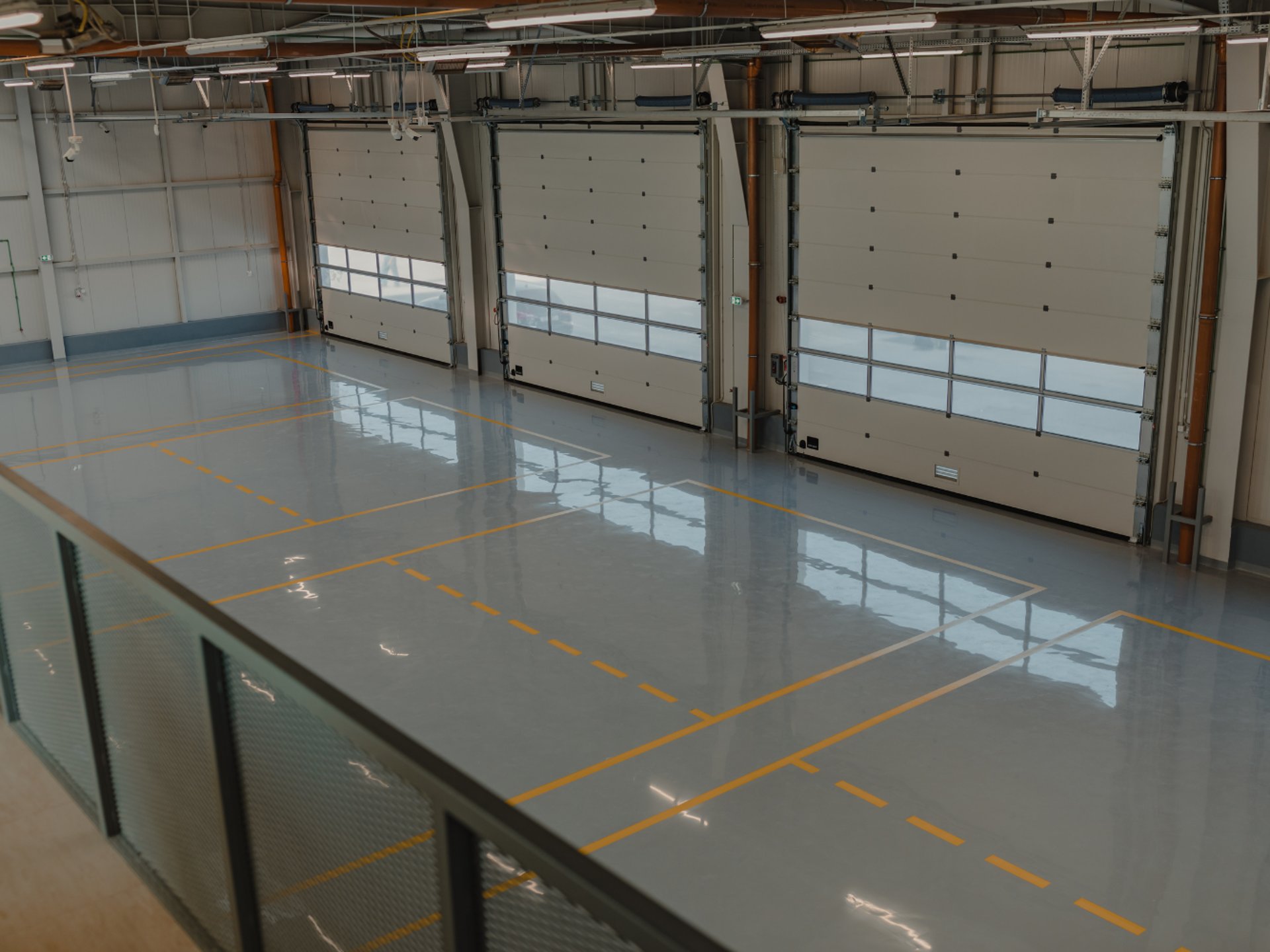 a bathroom with two sinks and a large mirror