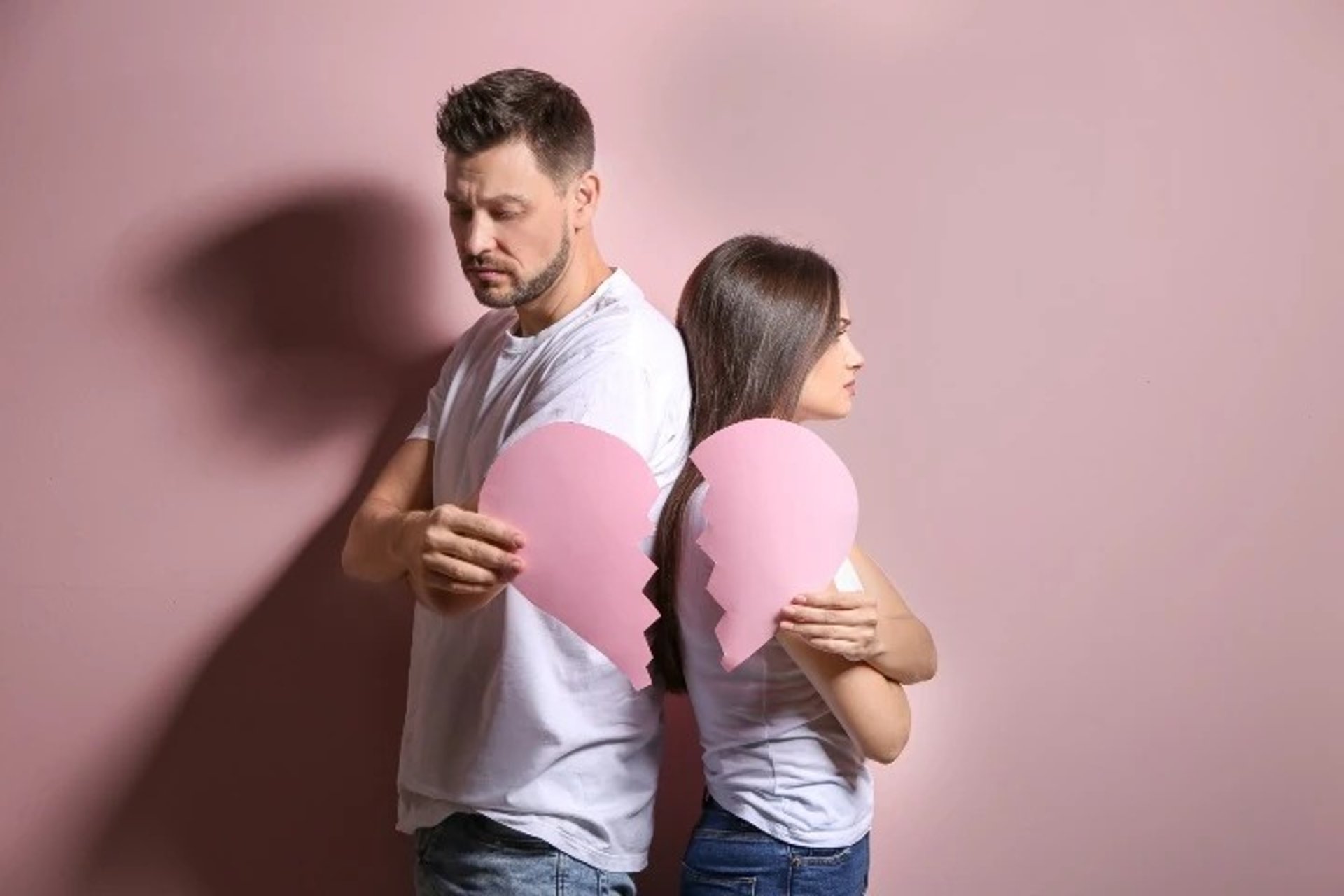 man touching face with both hands