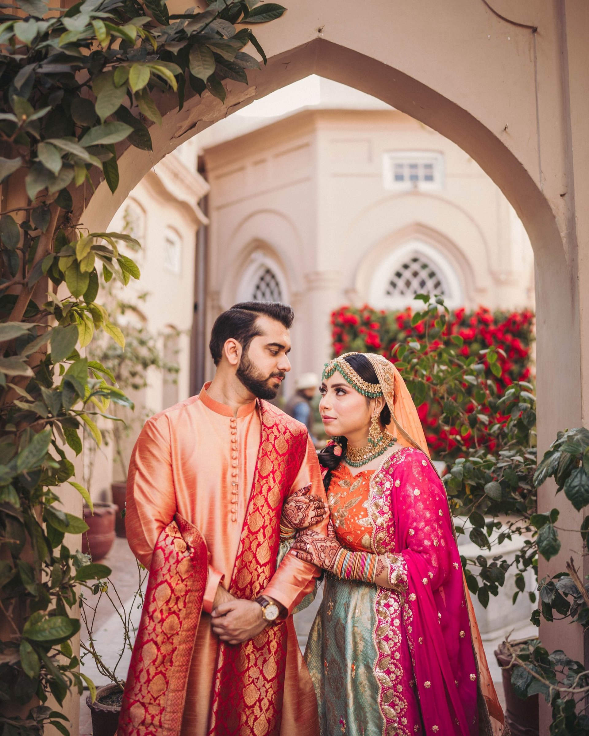 woman wearing yellow long-sleeved dress under white clouds and blue sky during daytime