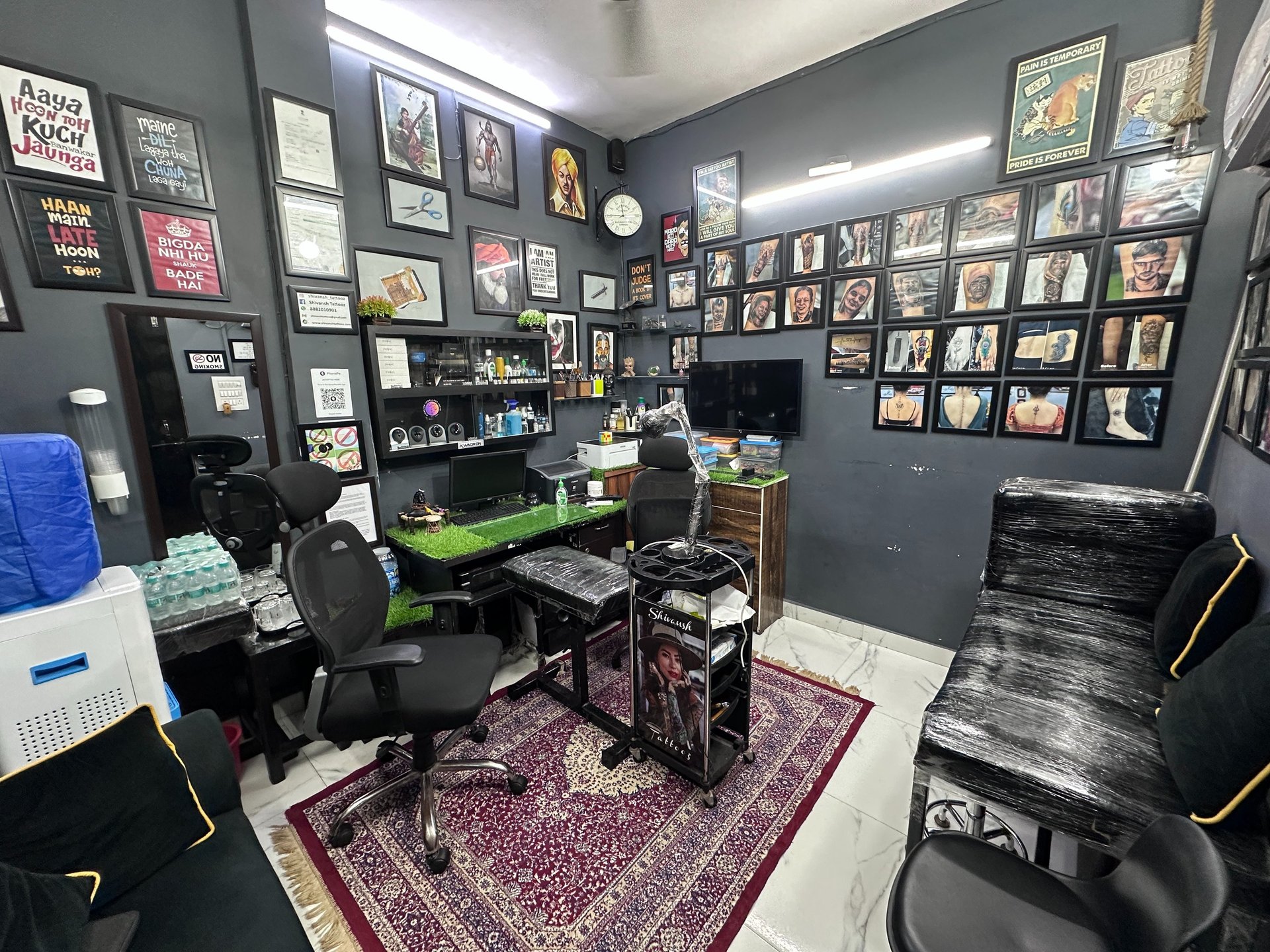 black and brown leather padded tub sofa