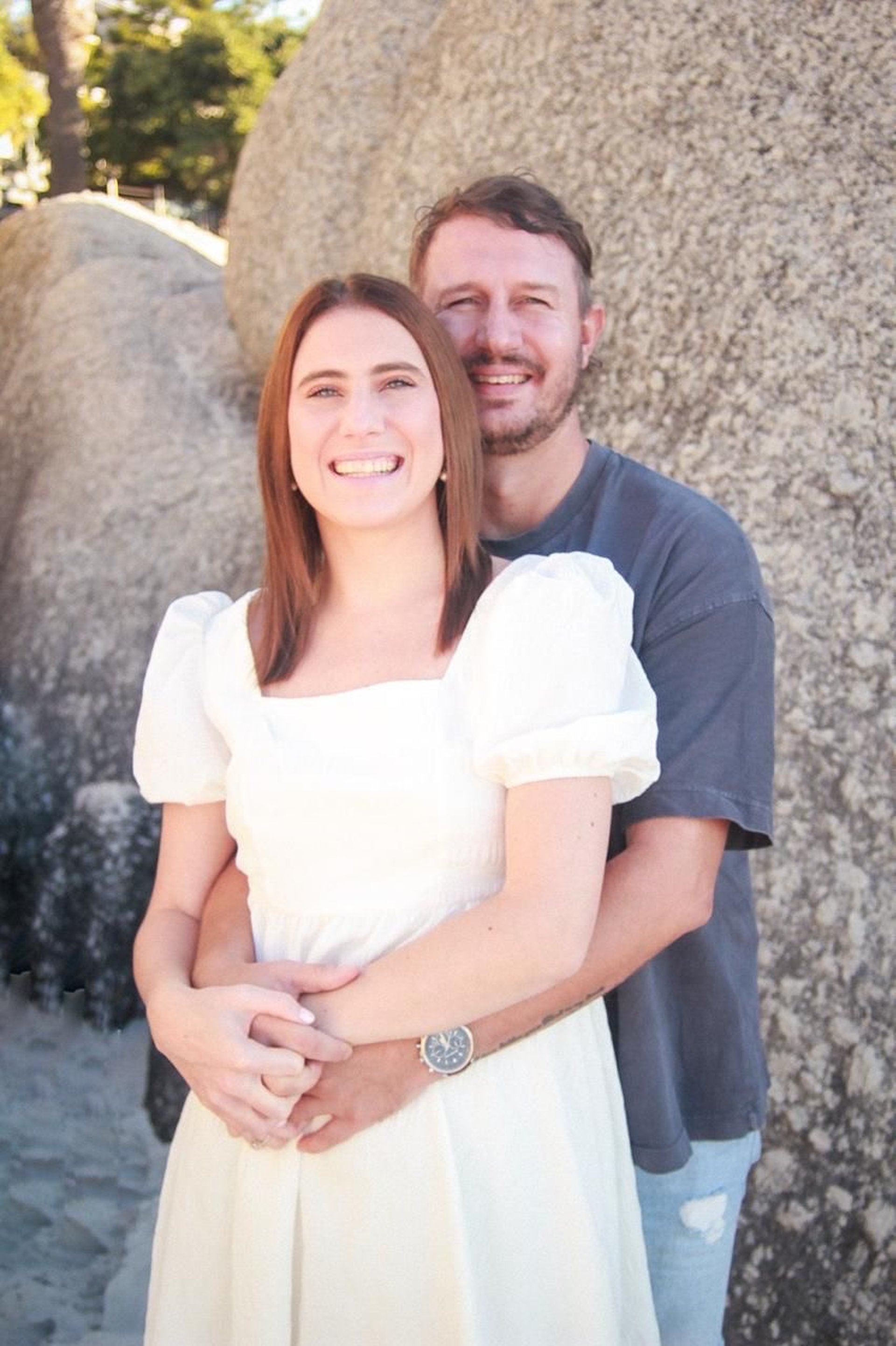 couple wearing silver-colored rings