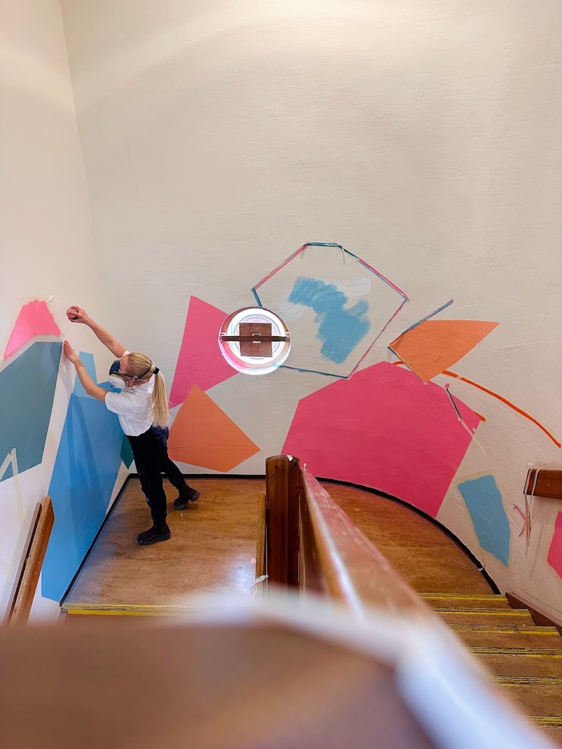 woman wearing yellow long-sleeved dress under white clouds and blue sky during daytime