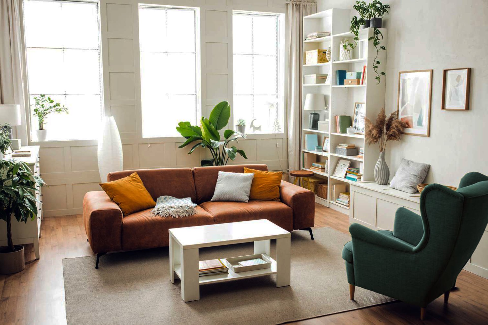 white and brown concrete building near green grass field during daytime