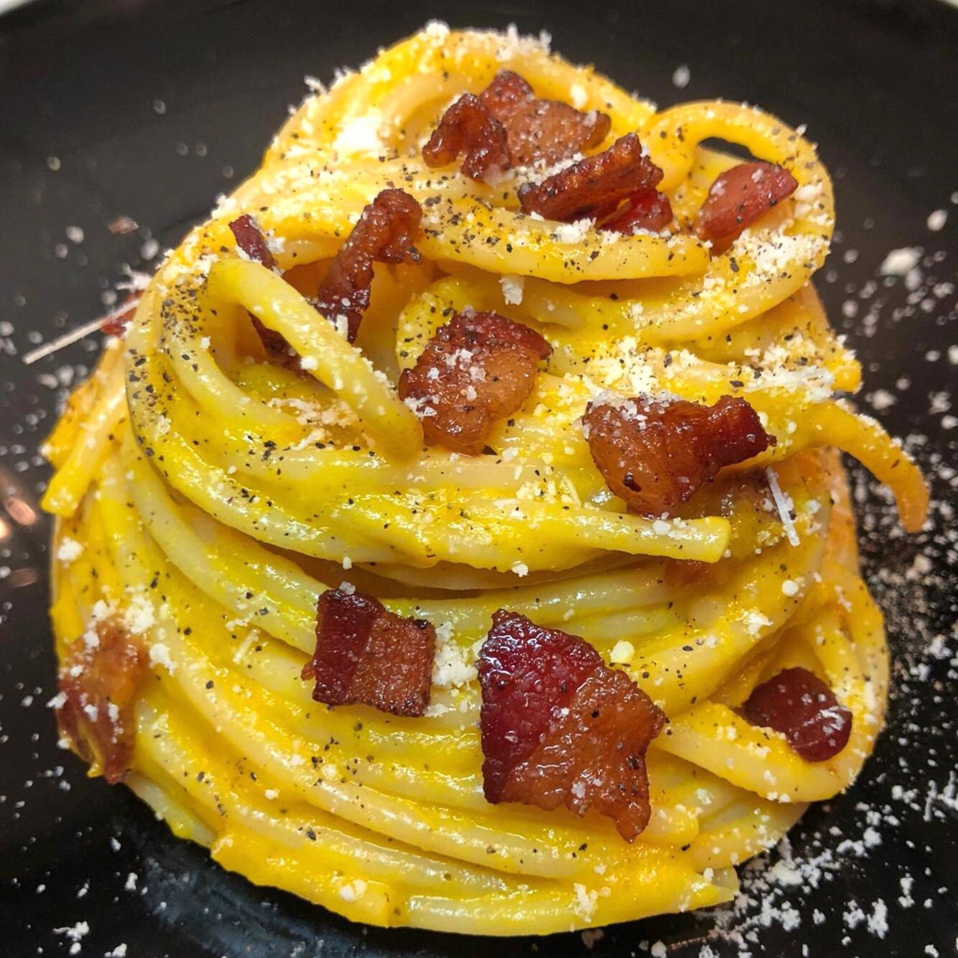 woman wearing yellow long-sleeved dress under white clouds and blue sky during daytime