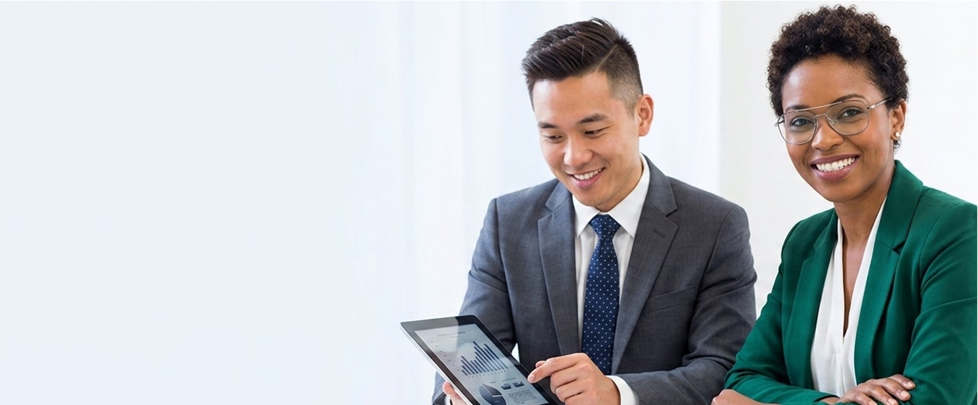 an abstract photo of a curved building with a blue sky in the background