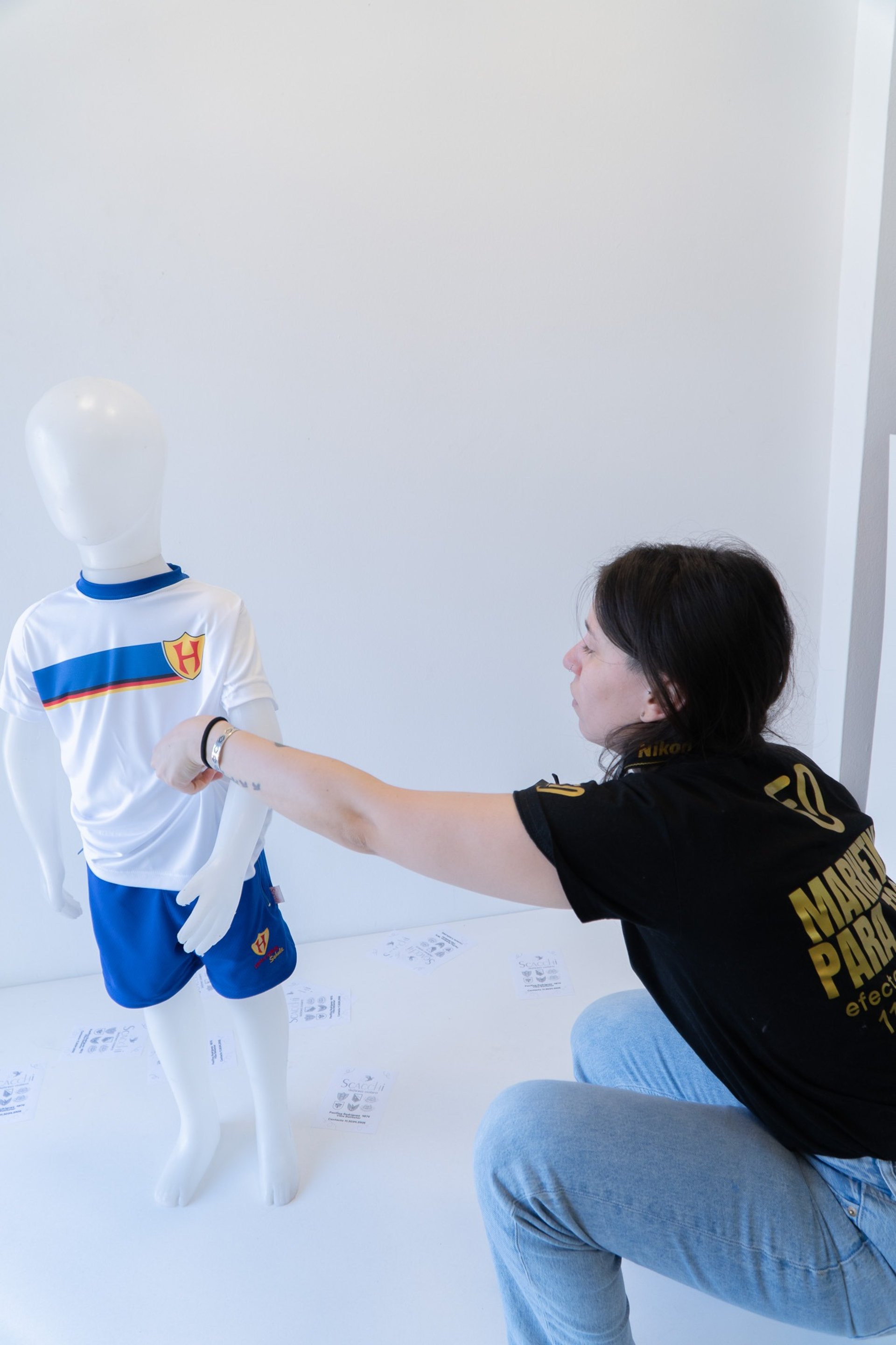 an abstract photo of a curved building with a blue sky in the background