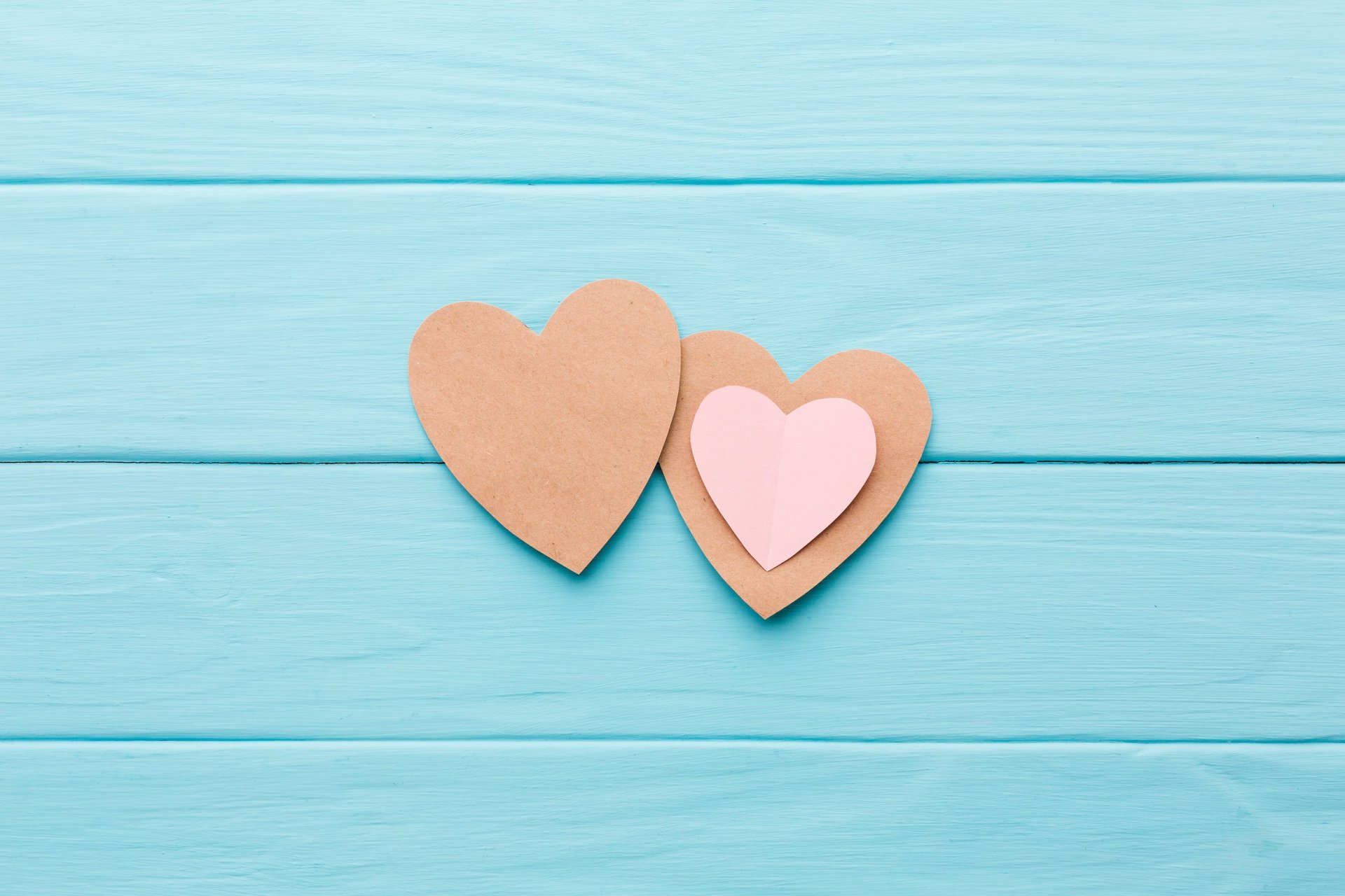 person with blue paint on hand