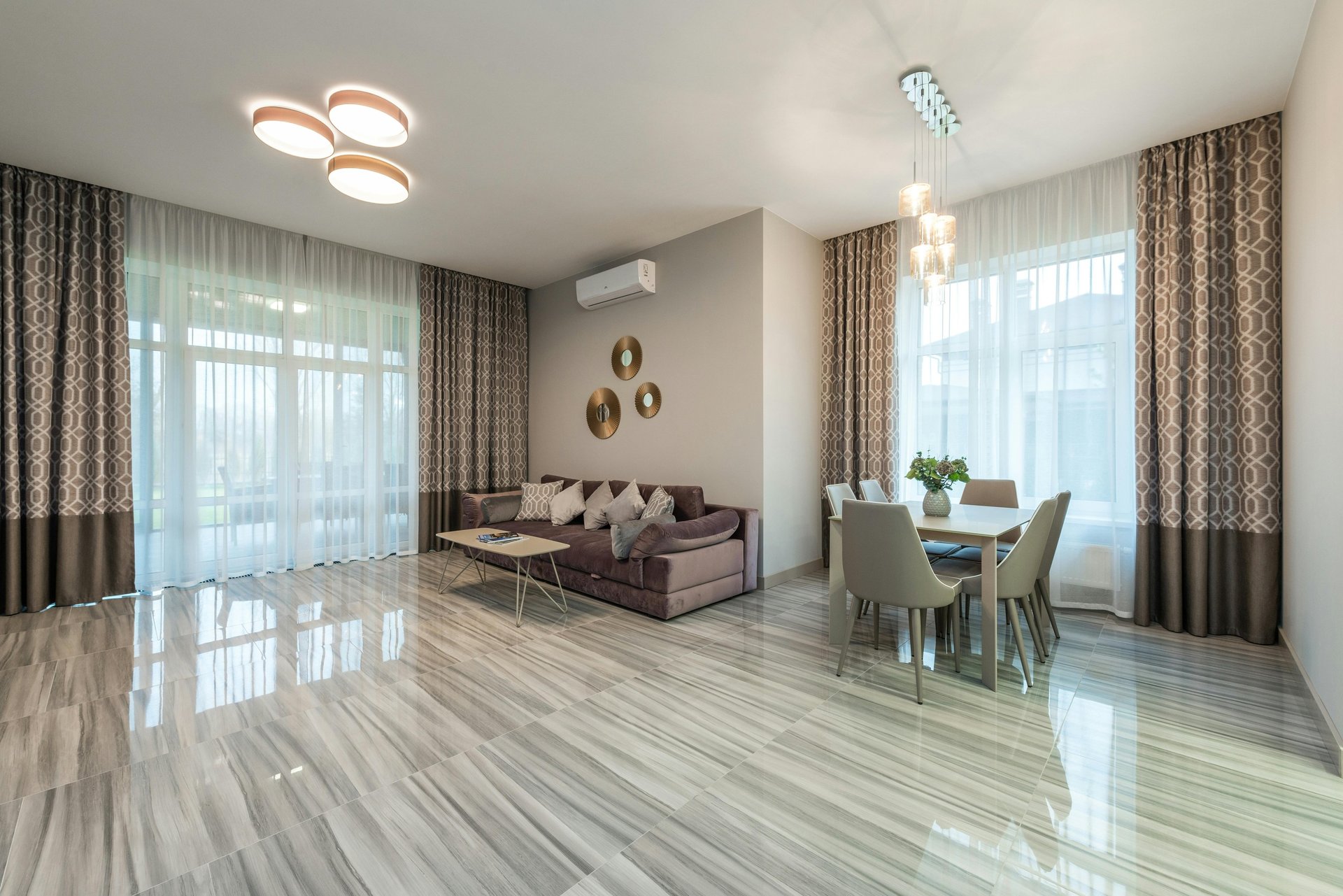 an abstract photo of a curved building with a blue sky in the background