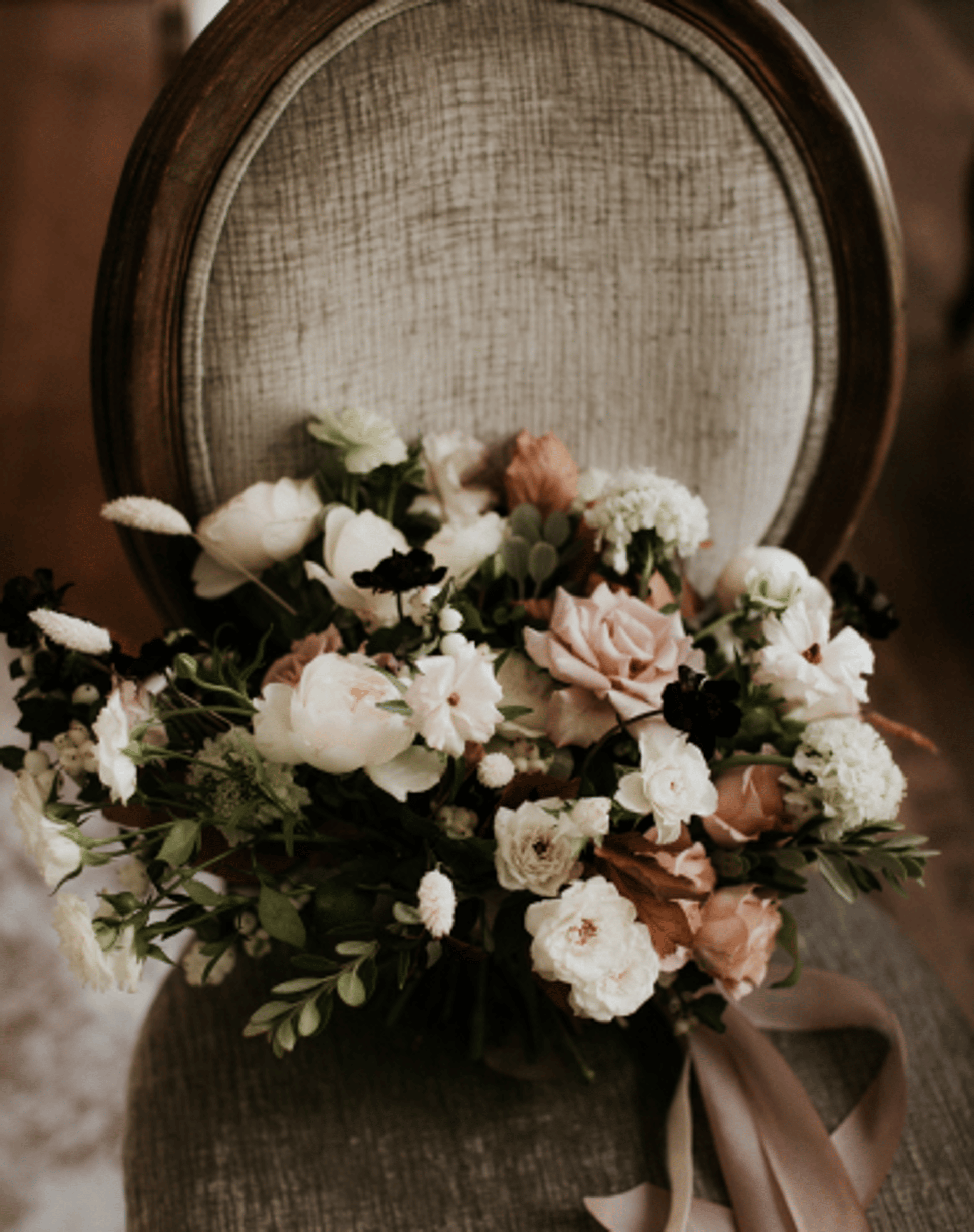 an abstract photo of a curved building with a blue sky in the background
