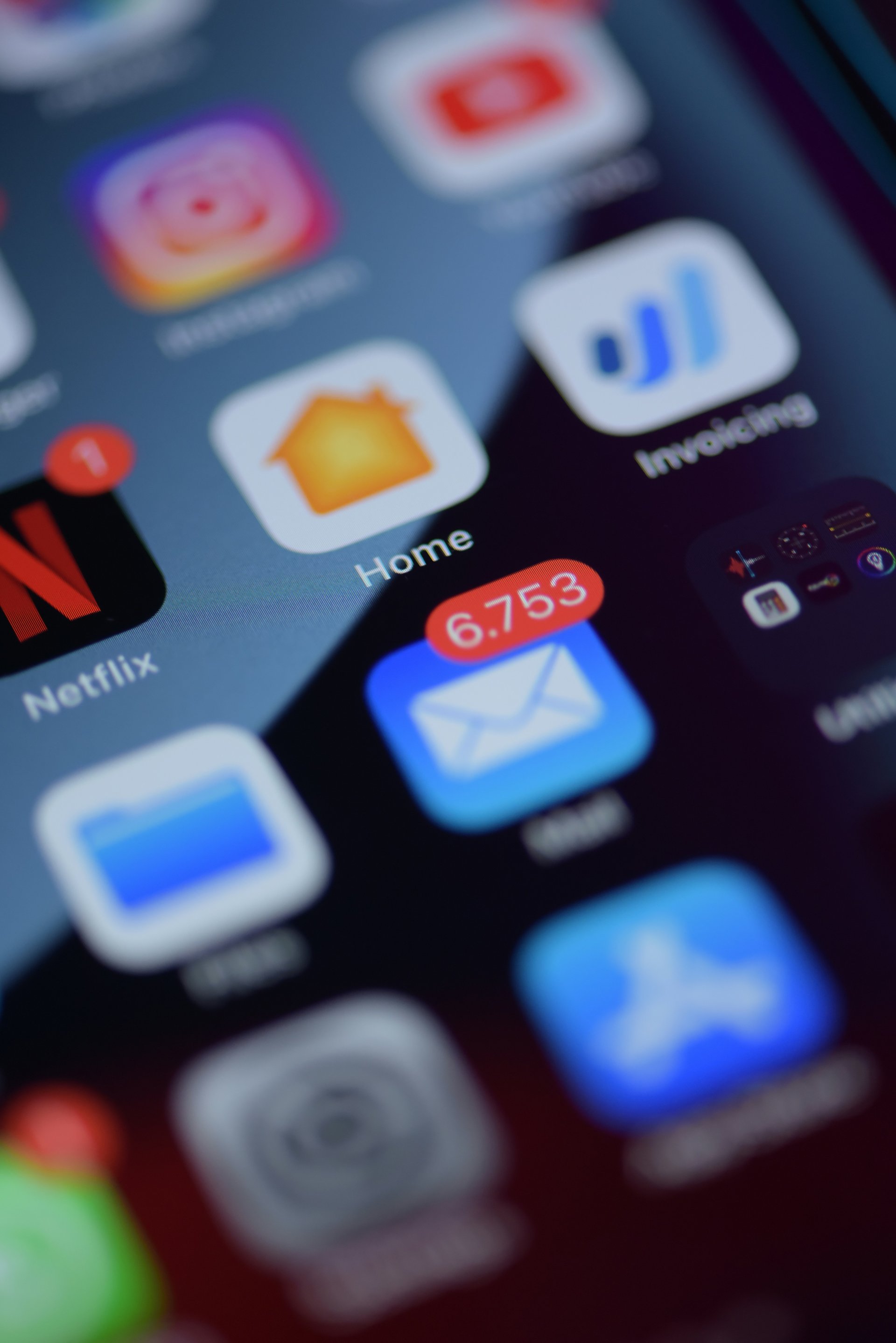 an abstract photo of a curved building with a blue sky in the background