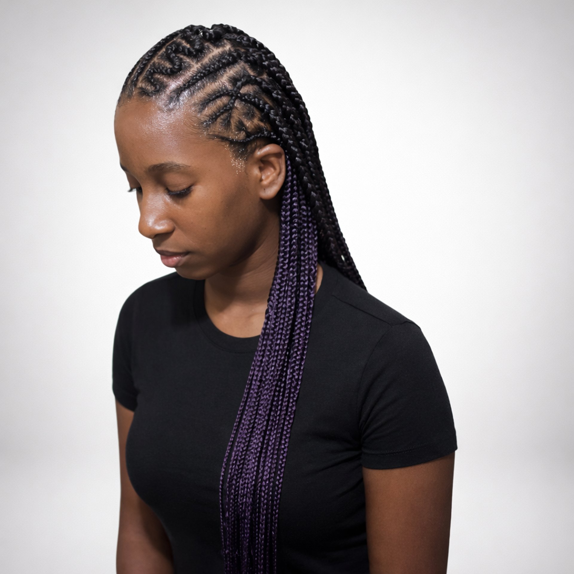 an abstract photo of a curved building with a blue sky in the background
