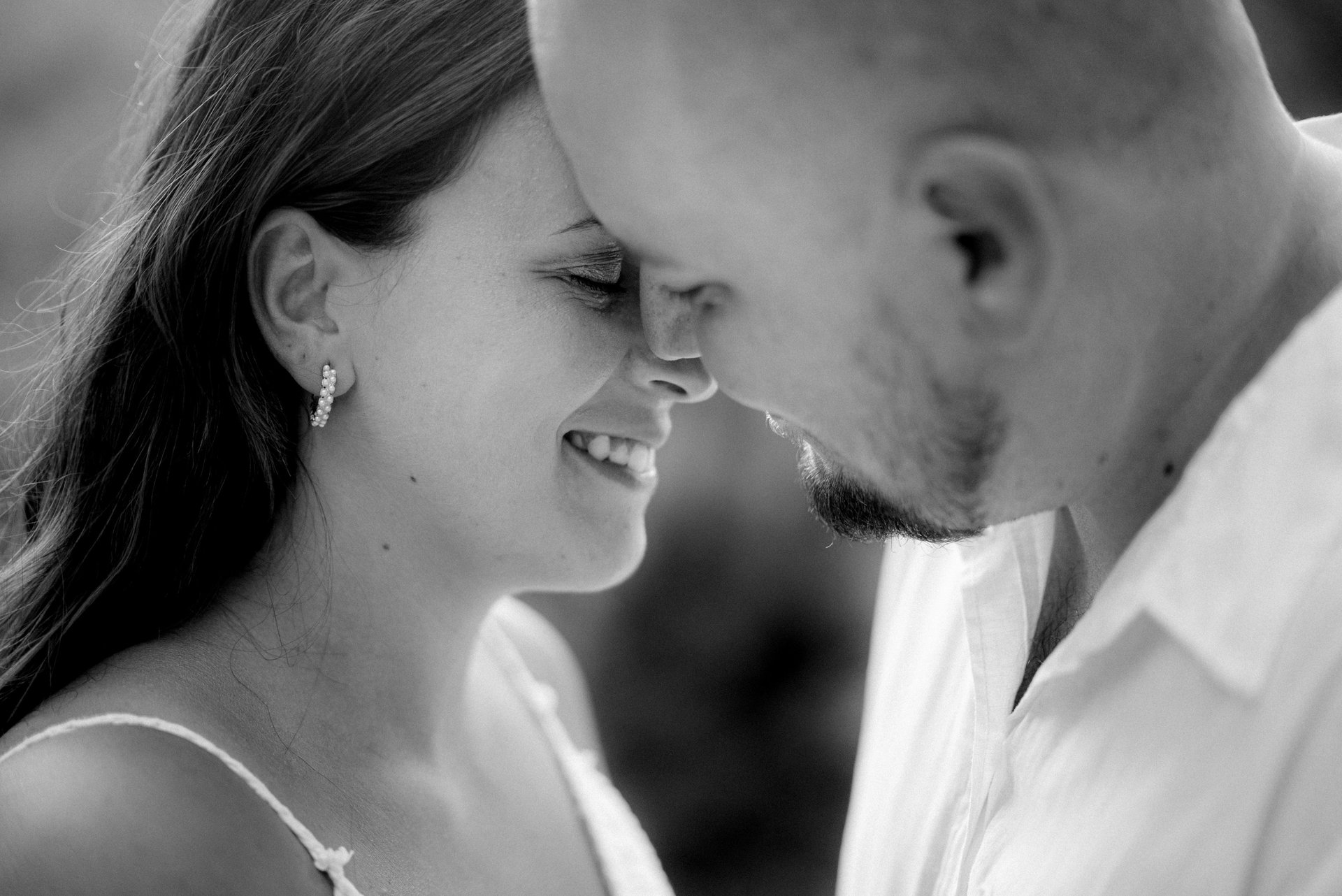 couple wearing silver-colored rings