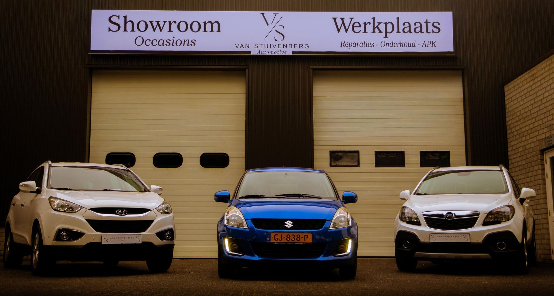 black and brown leather padded tub sofa
