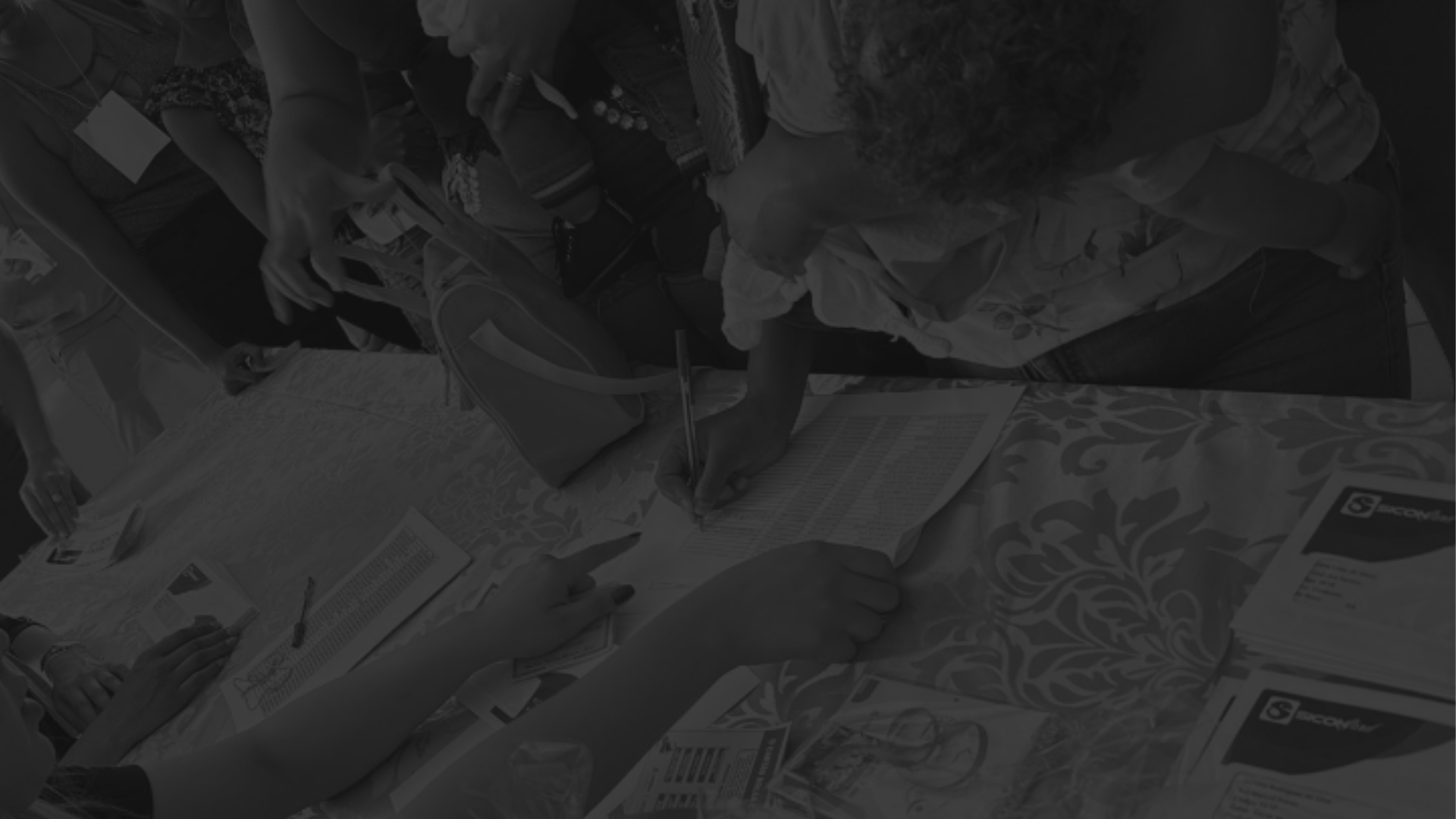 an abstract photo of a curved building with a blue sky in the background