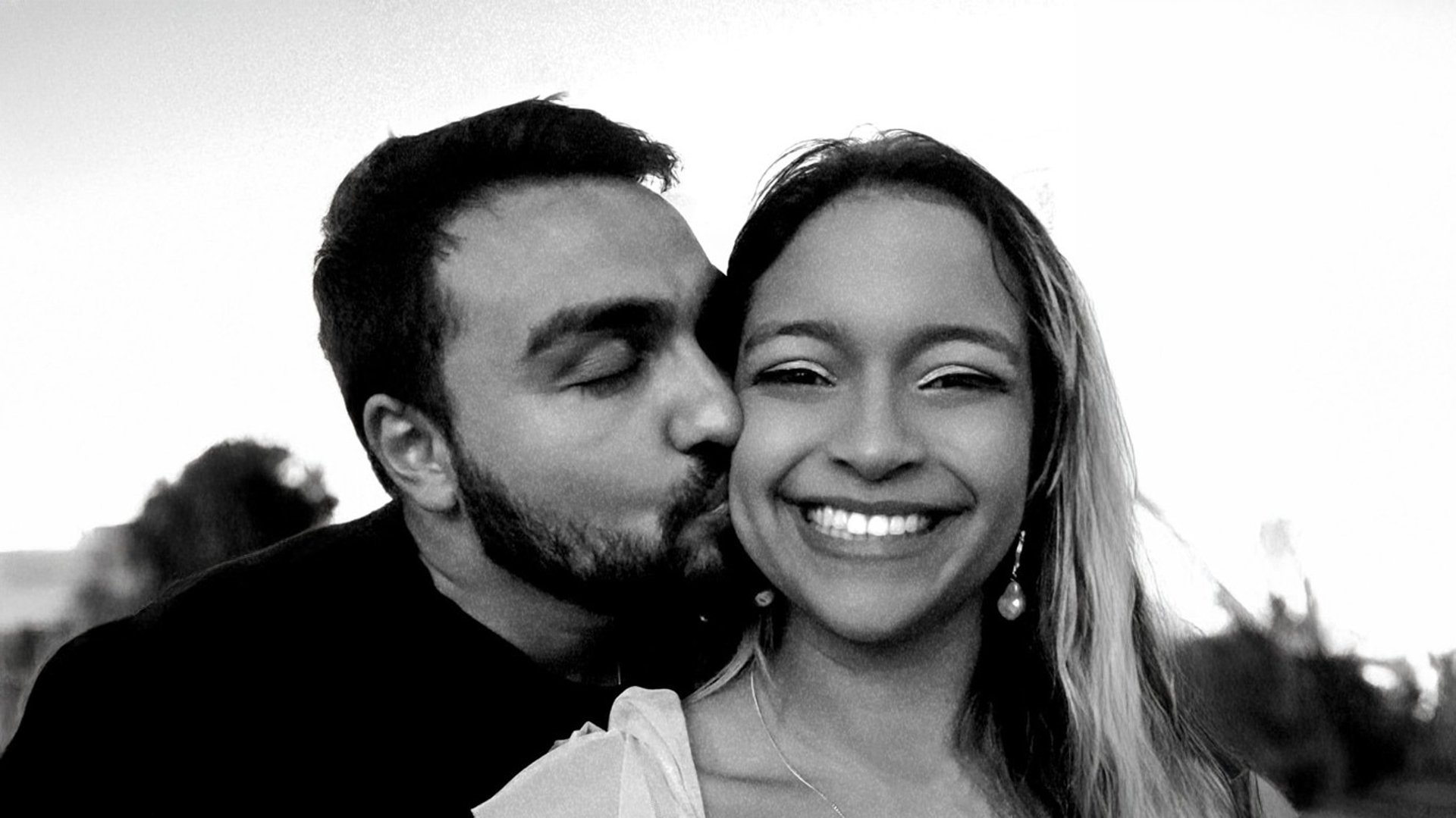 couple wearing silver-colored rings