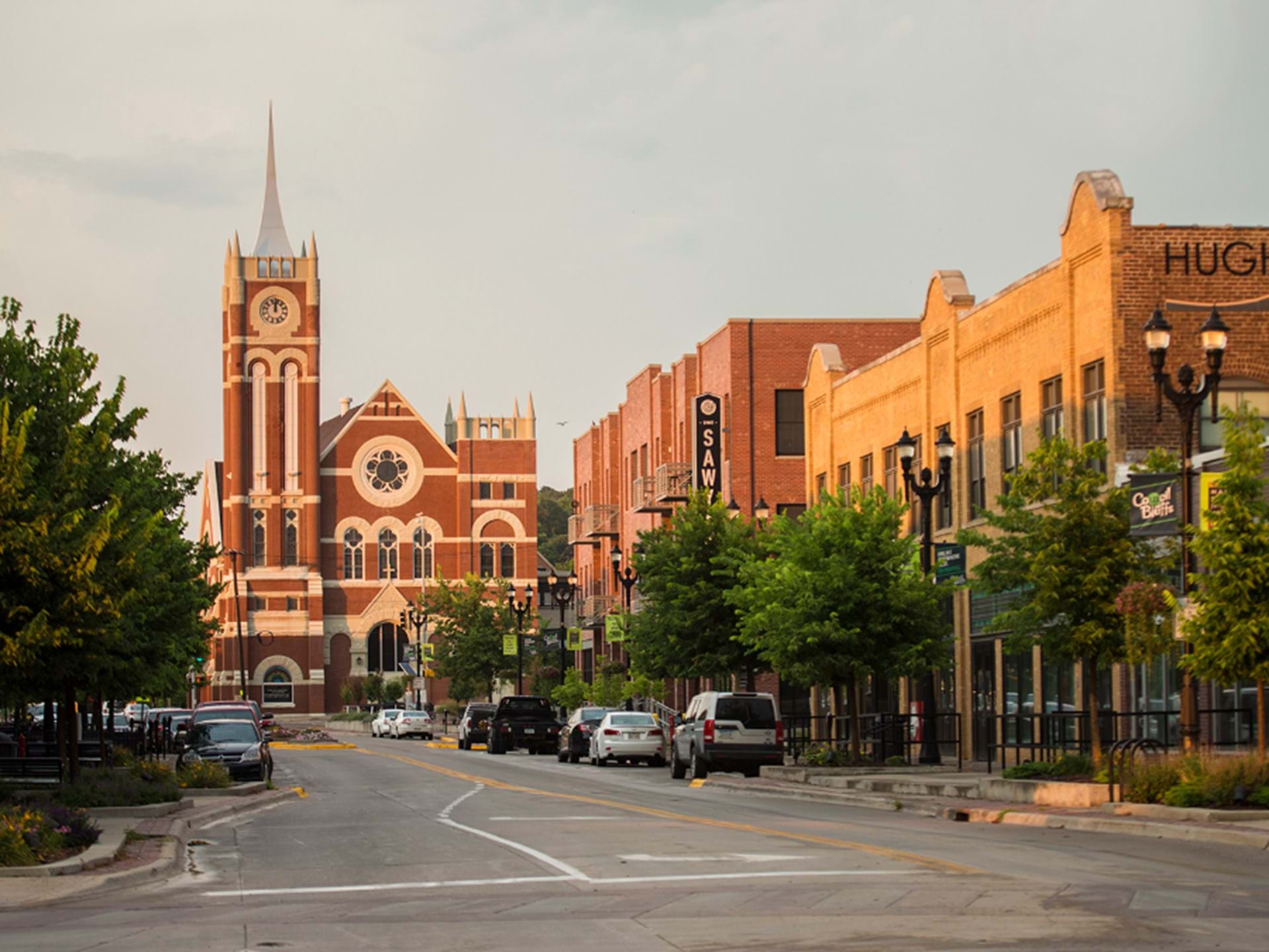 silhouette of mountain under cloudy sky during sunset