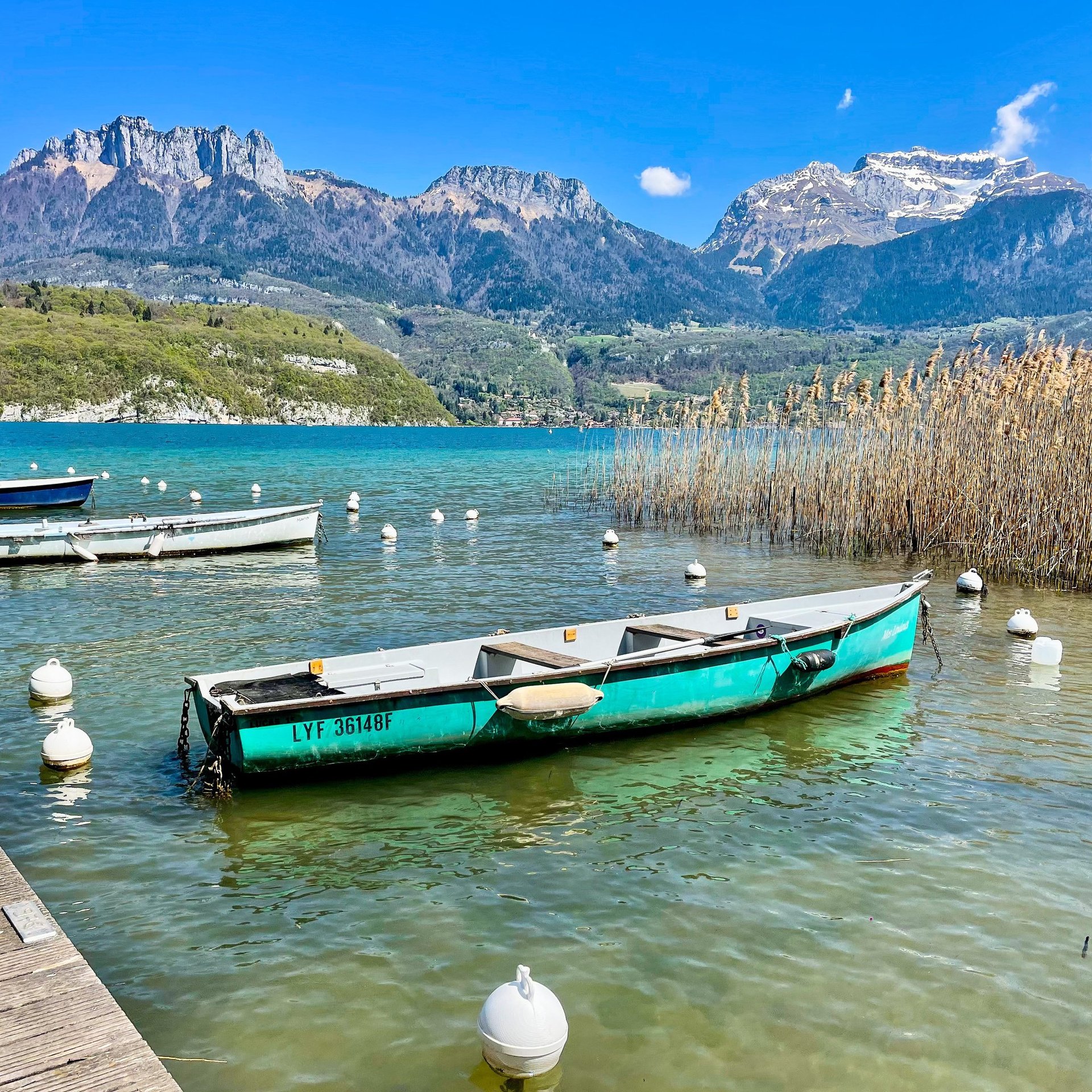 an abstract photo of a curved building with a blue sky in the background