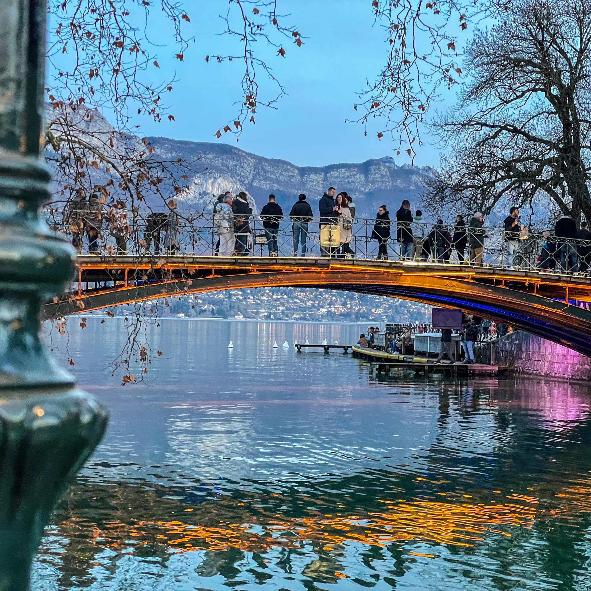 an abstract photo of a curved building with a blue sky in the background
