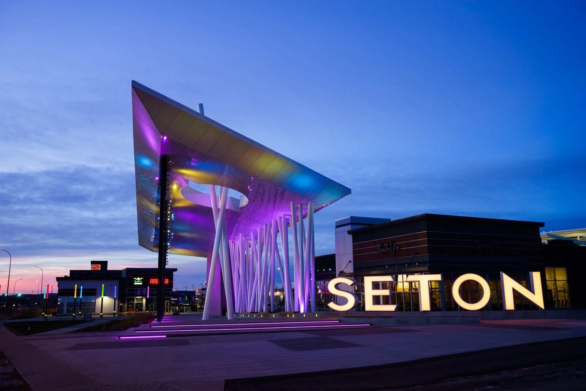 city skyline across body of water during daytime