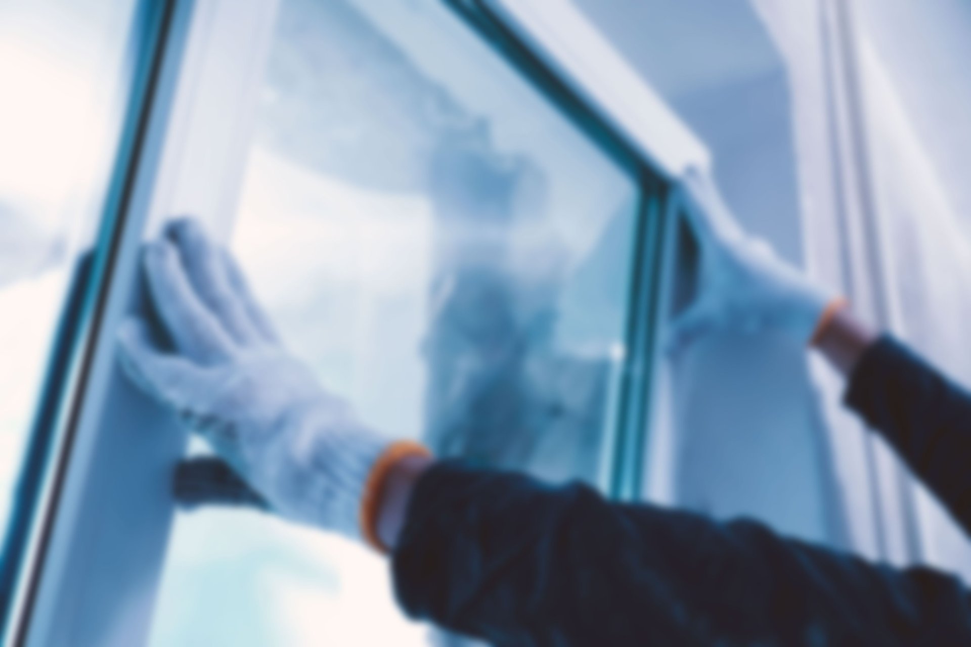 an abstract photo of a curved building with a blue sky in the background