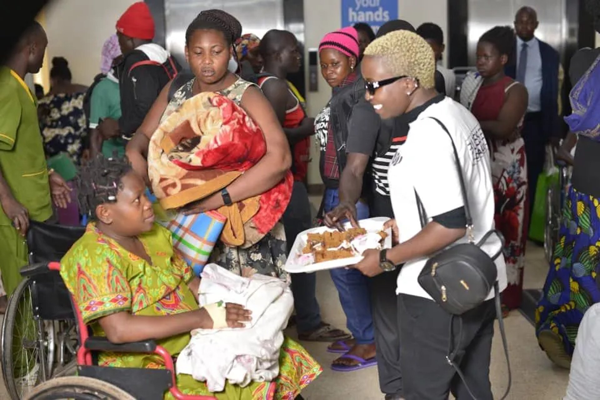 an abstract photo of a curved building with a blue sky in the background