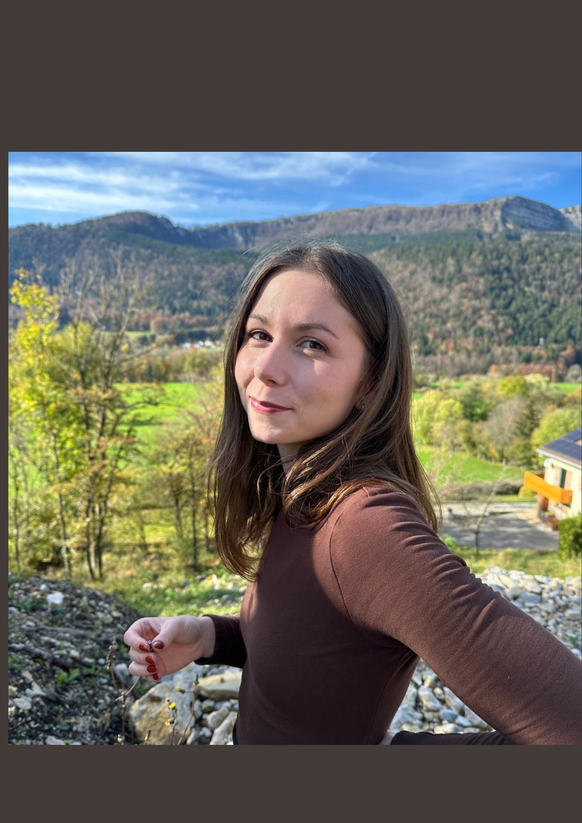 an abstract photo of a curved building with a blue sky in the background