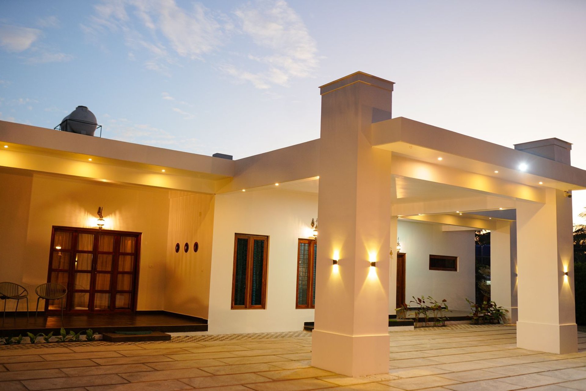 an abstract photo of a curved building with a blue sky in the background
