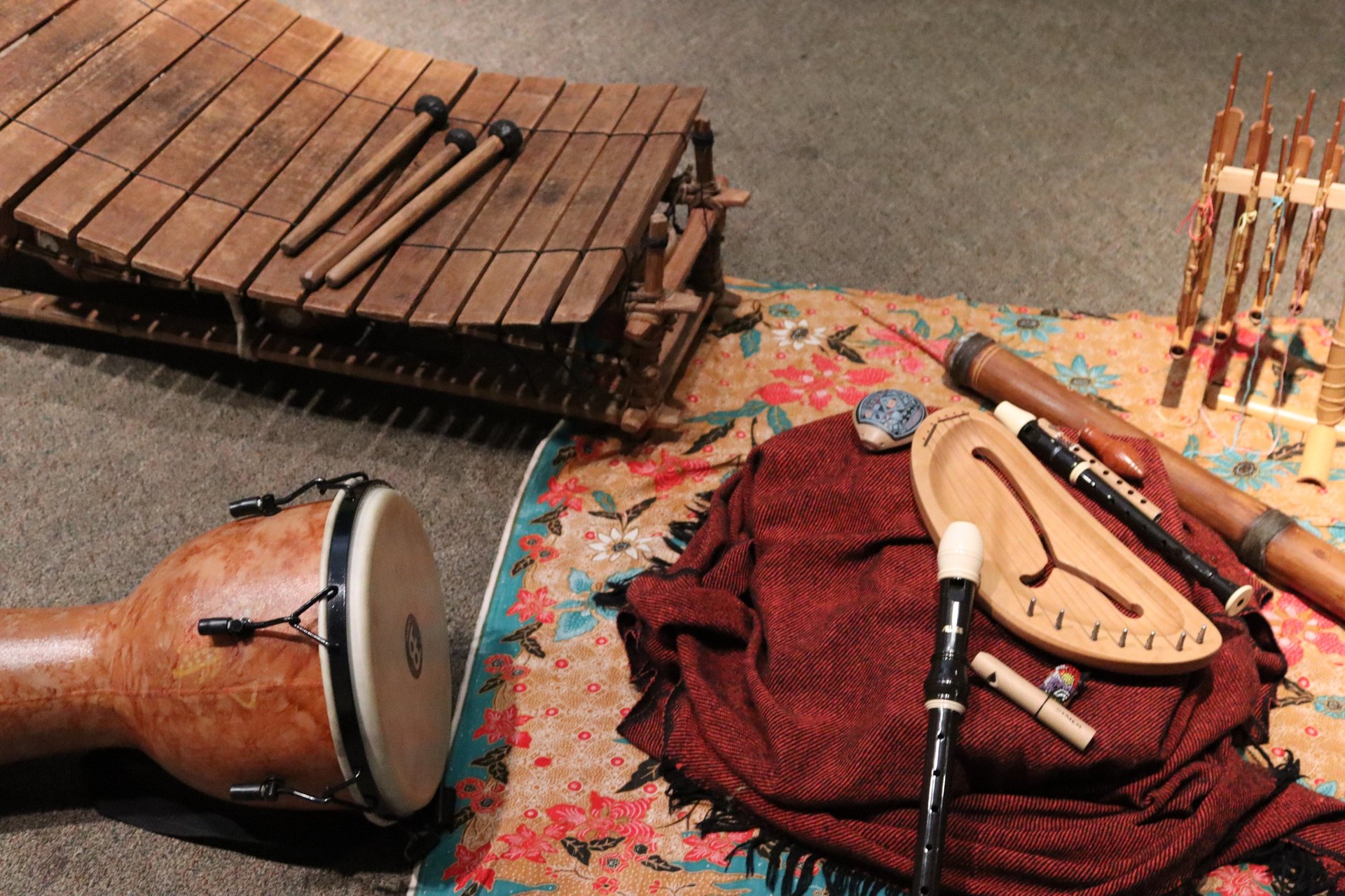 woman wearing yellow long-sleeved dress under white clouds and blue sky during daytime