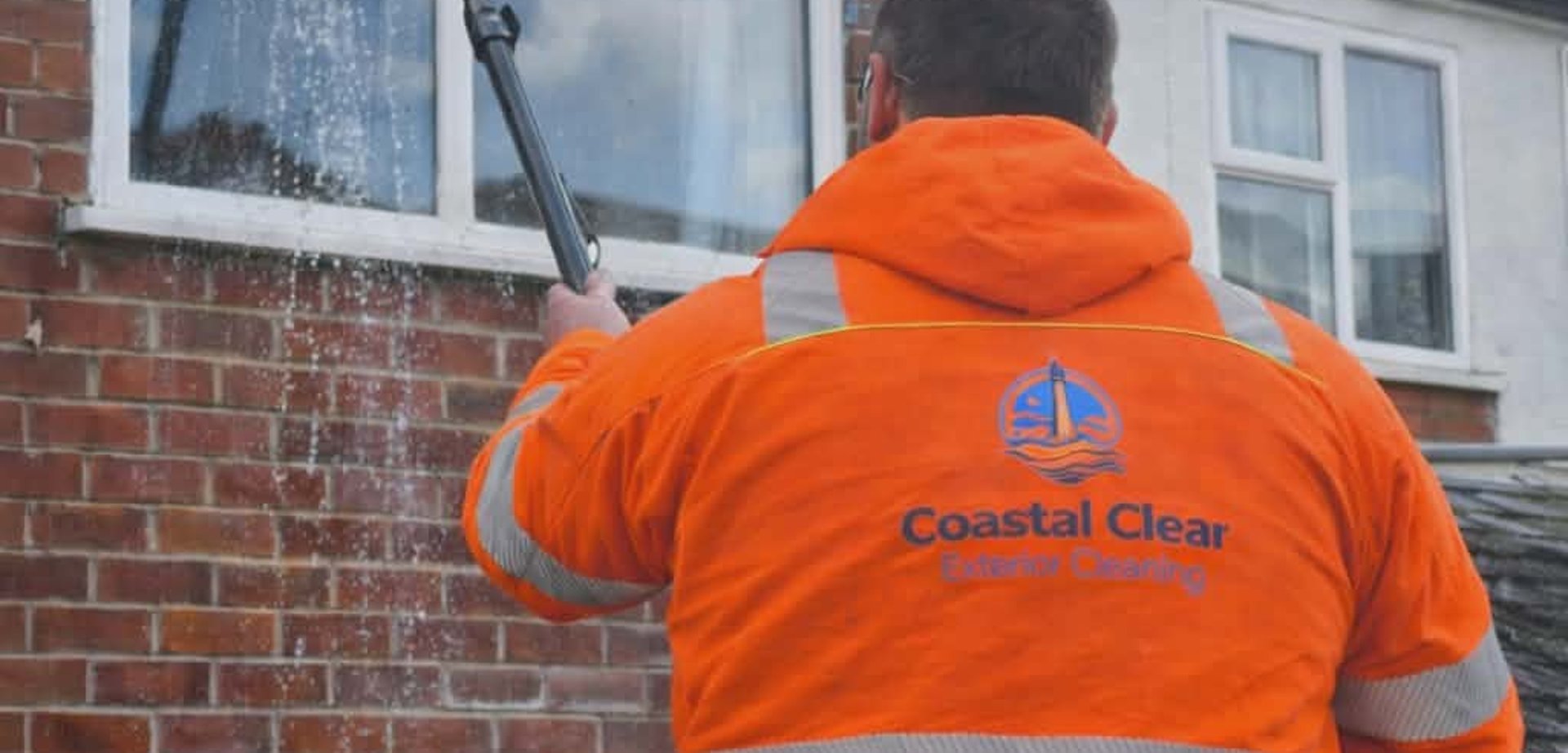 black and brown leather padded tub sofa