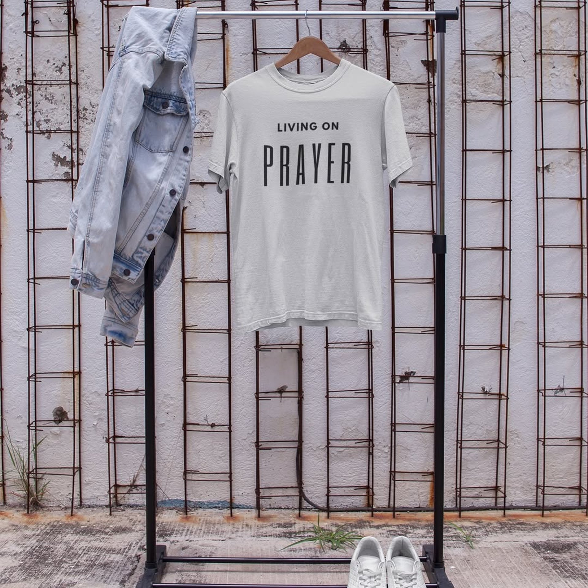 white crew neck shirt on white and green floral textile