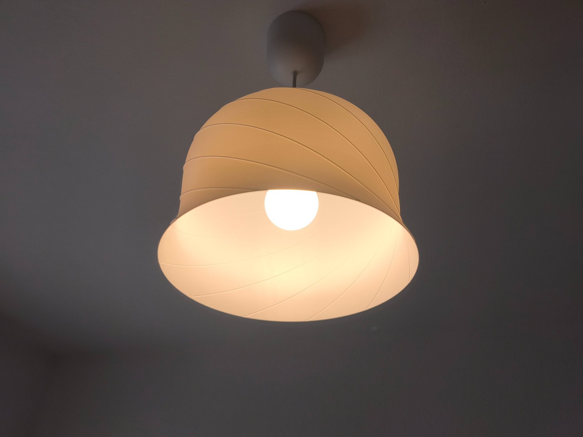 person wearing grey knit sweater