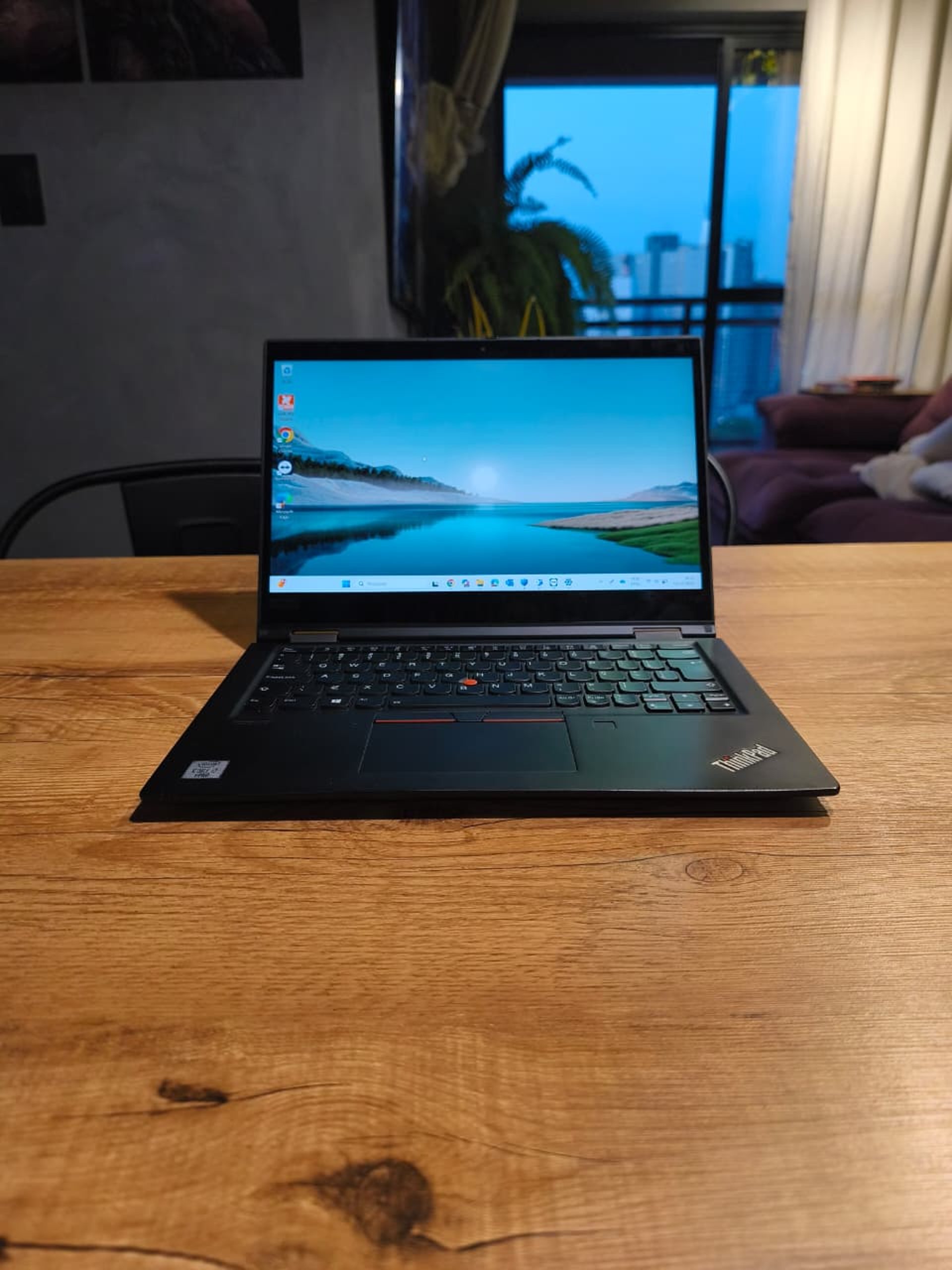 MacBook Pro on top of brown table