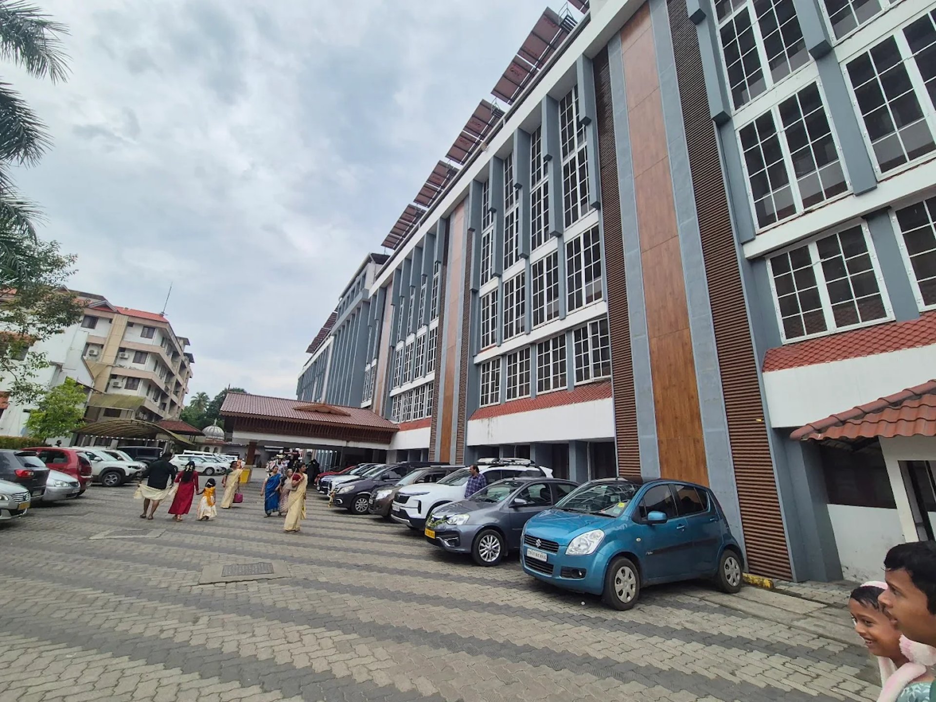 woman wearing yellow long-sleeved dress under white clouds and blue sky during daytime