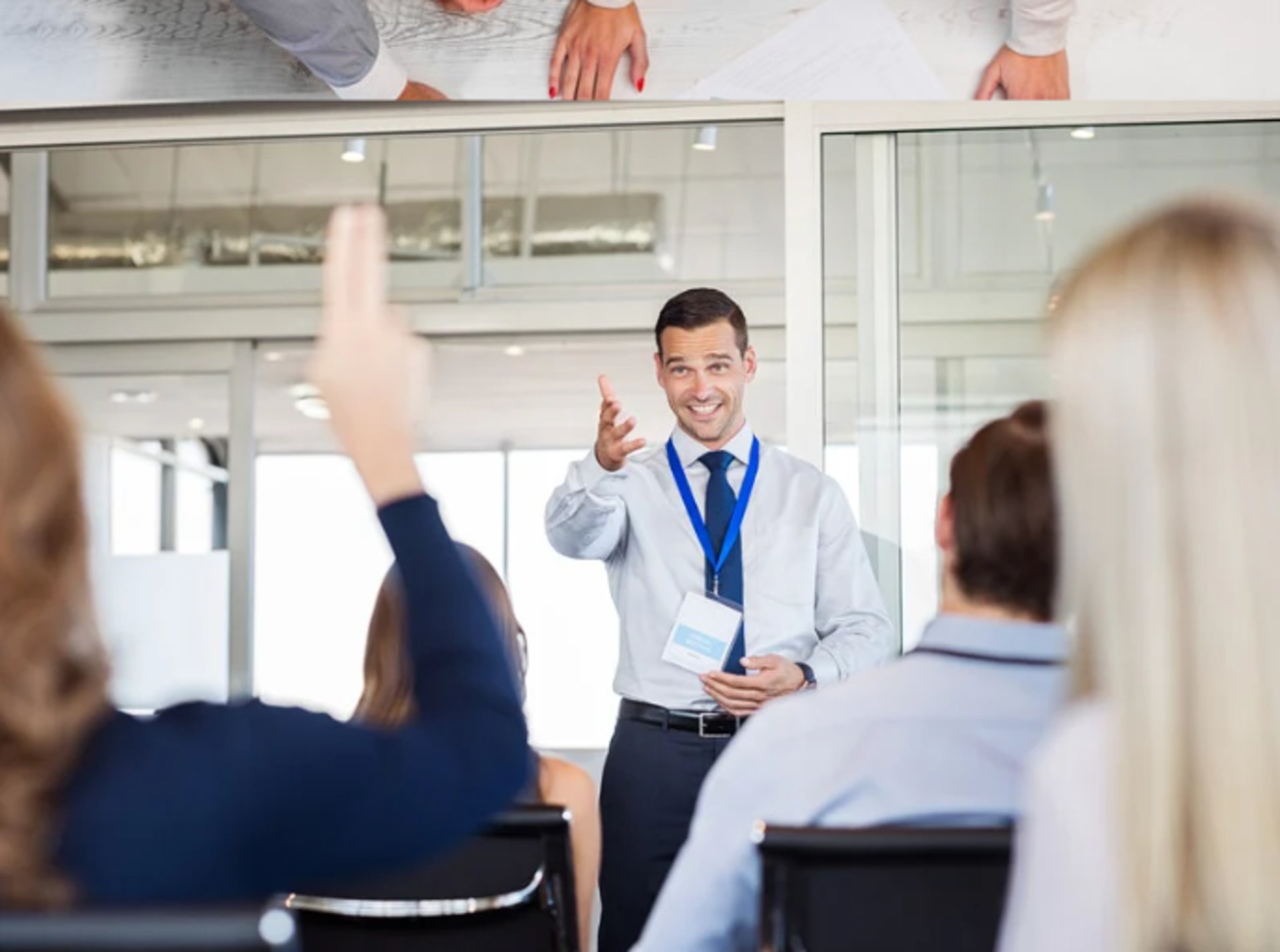 a person pouring a liquid into a cup