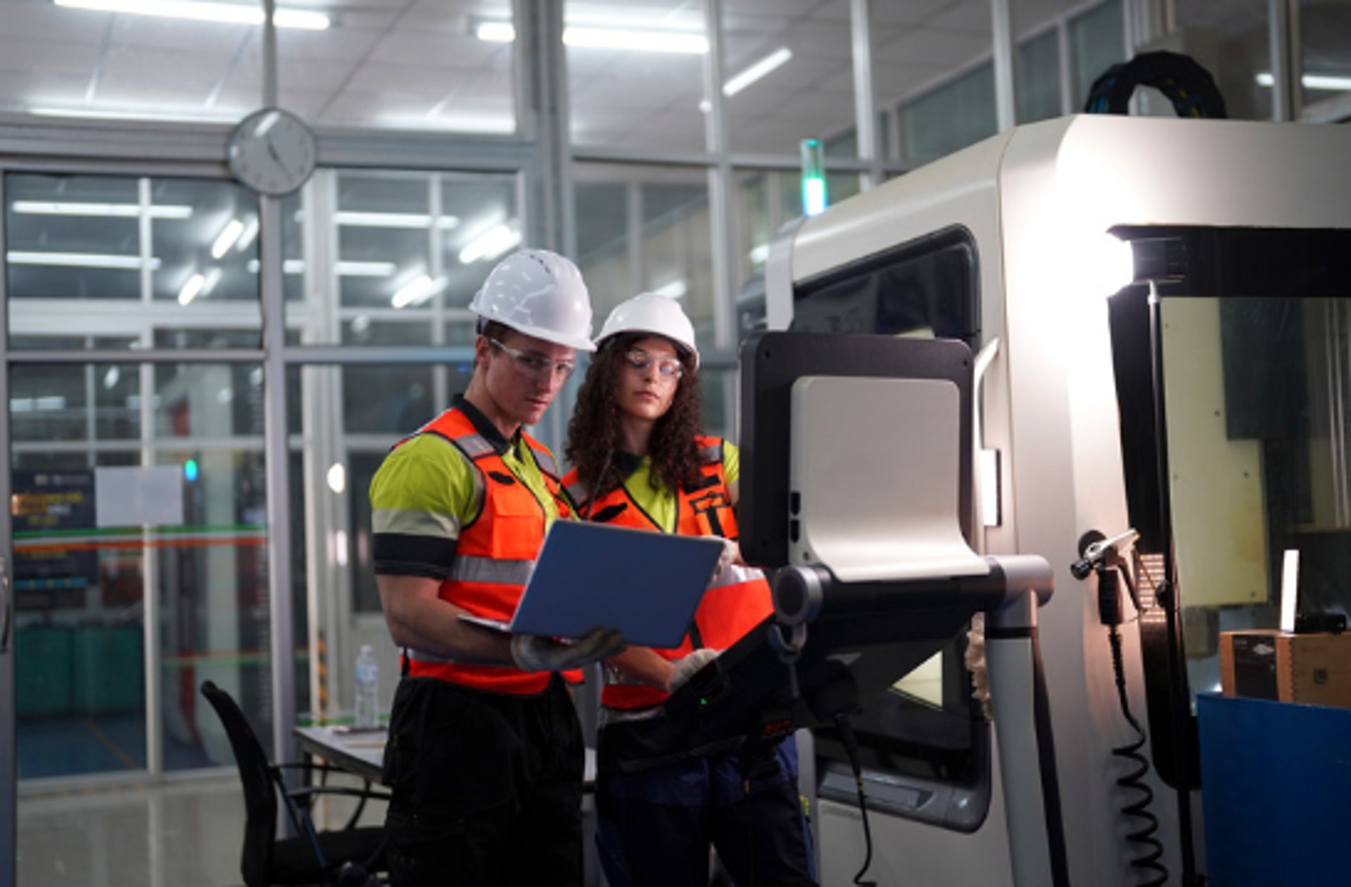an abstract photo of a curved building with a blue sky in the background