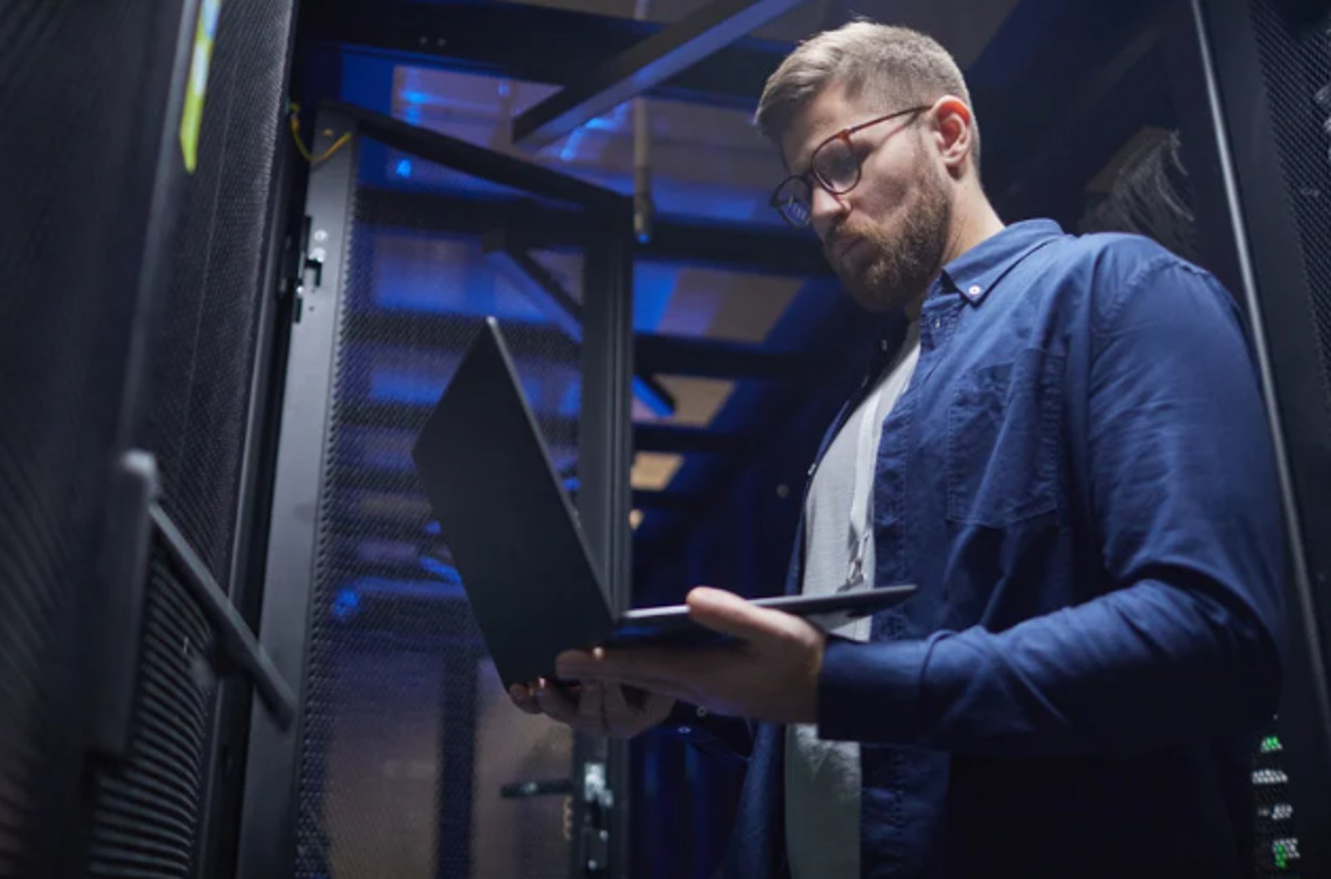an abstract photo of a curved building with a blue sky in the background