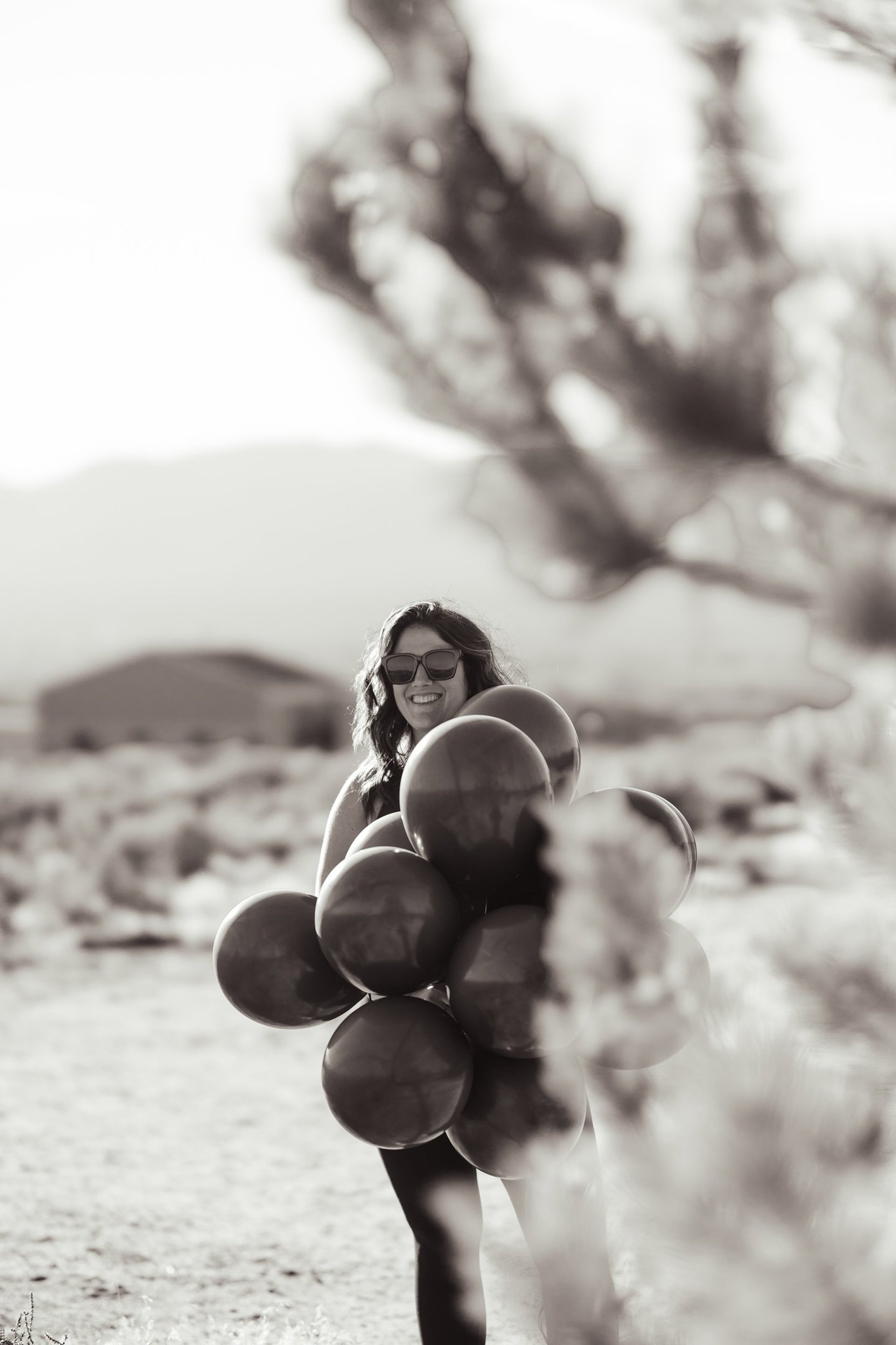 a black and white photo of rocks and water