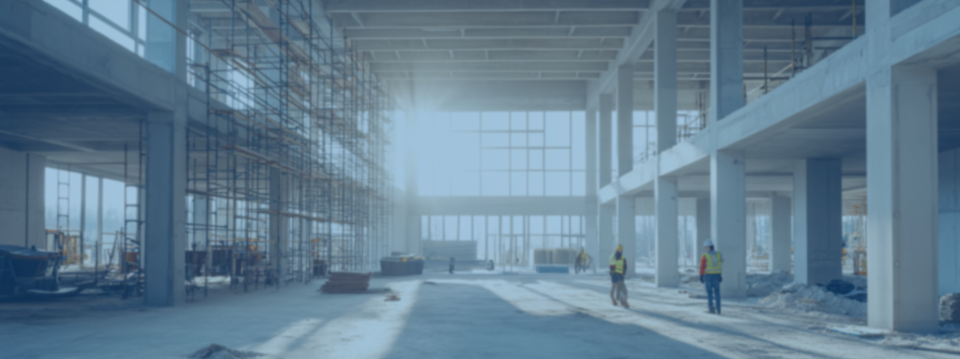 an abstract photo of a curved building with a blue sky in the background