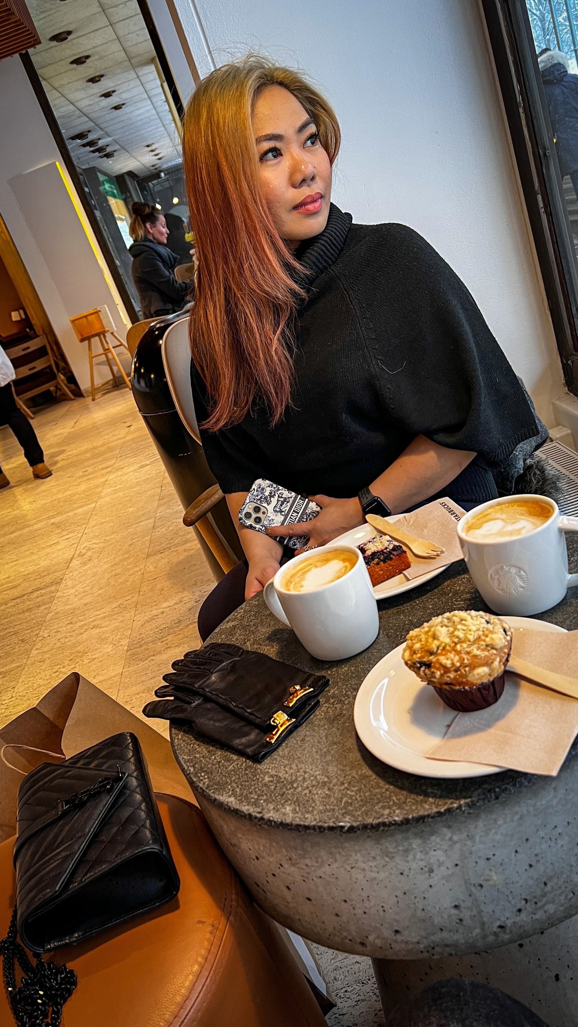 person wearing grey knit sweater