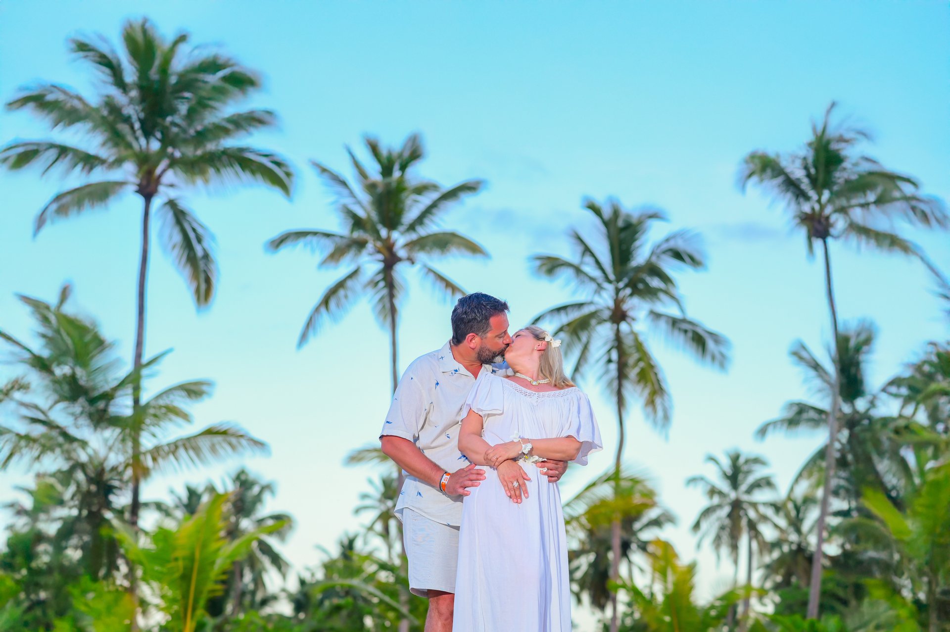woman wearing yellow long-sleeved dress under white clouds and blue sky during daytime