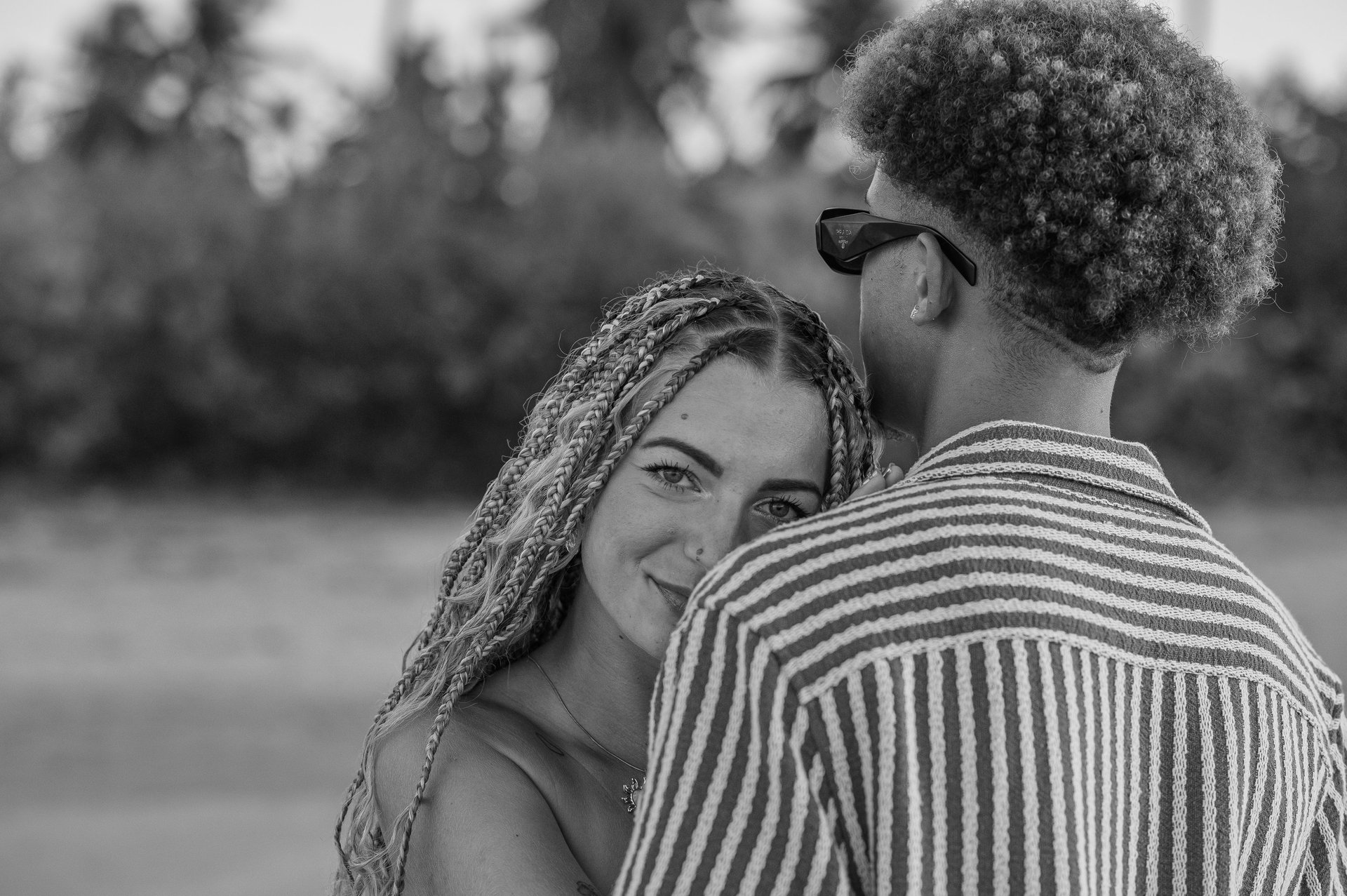 woman wearing yellow long-sleeved dress under white clouds and blue sky during daytime