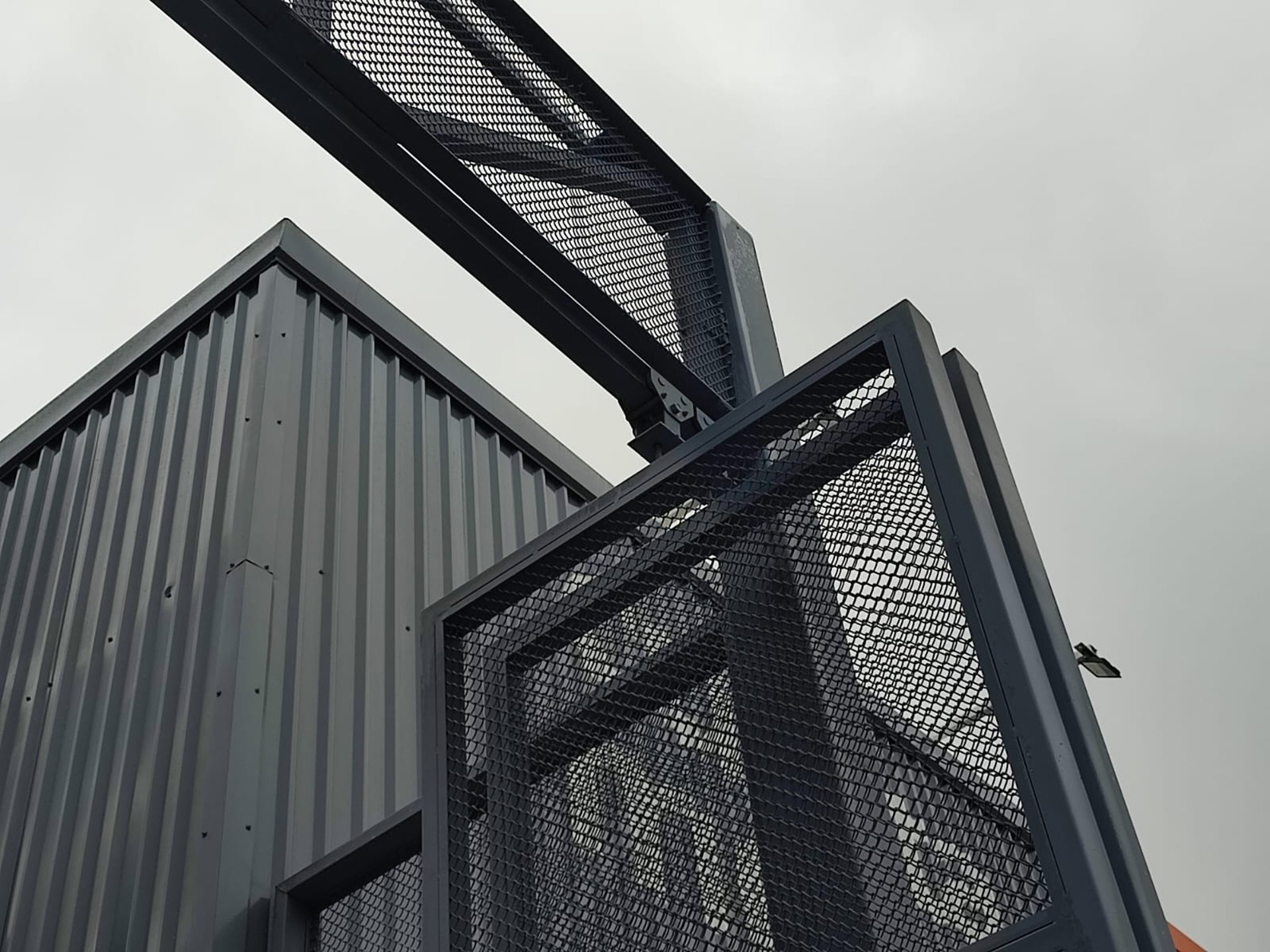 black and brown leather padded tub sofa