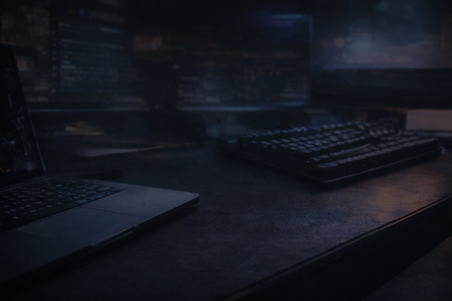 woman in pink shirt sitting in front of black laptop computer